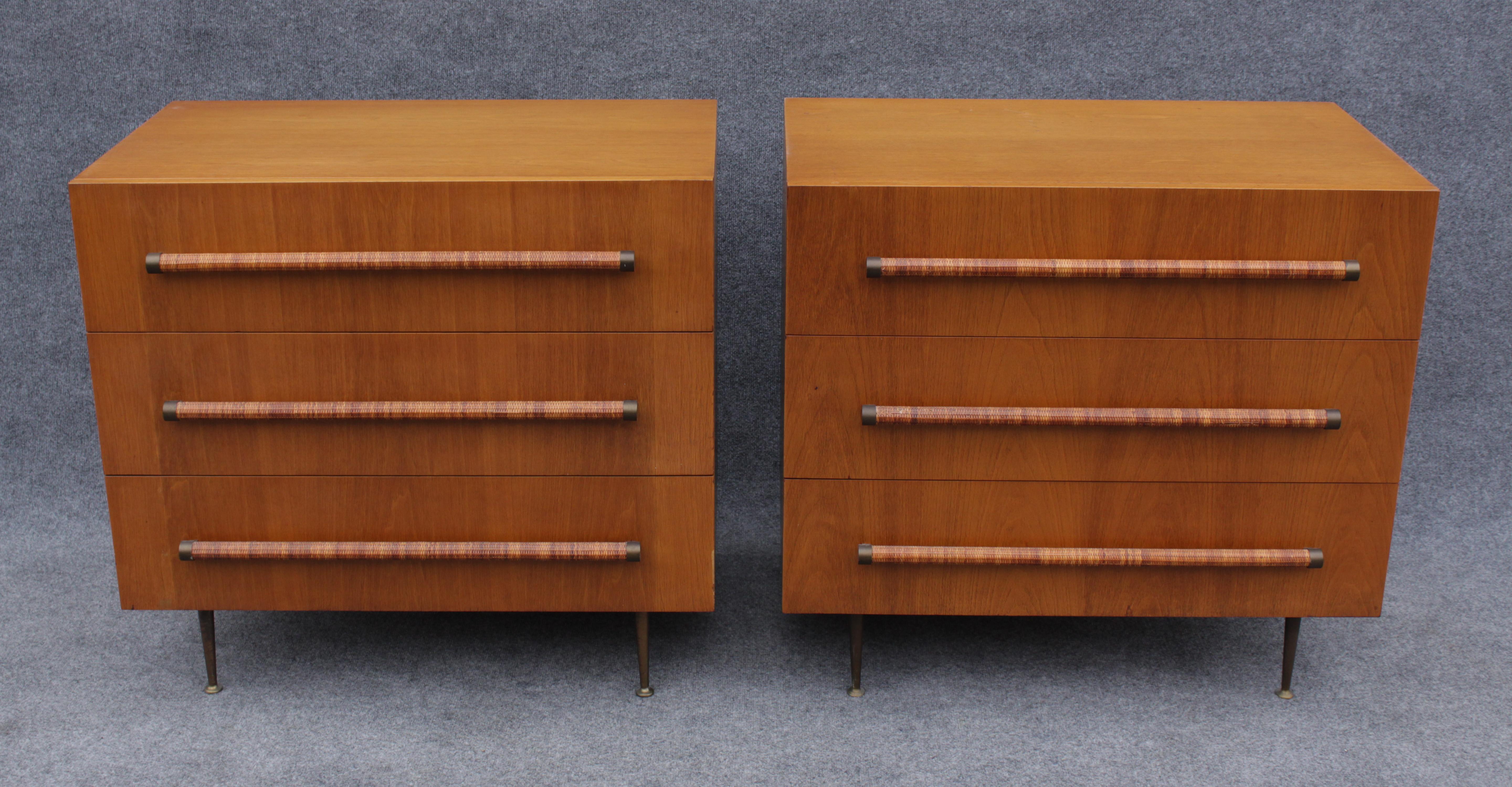 By American design legend T.H. Robsjohn Gibbings, these handsome dressers were made by Widdicomb, manufacturer of choice for many other historical designers. As expected of Widdicomb, the quality of these dressers is top-notch. Made of walnut, they