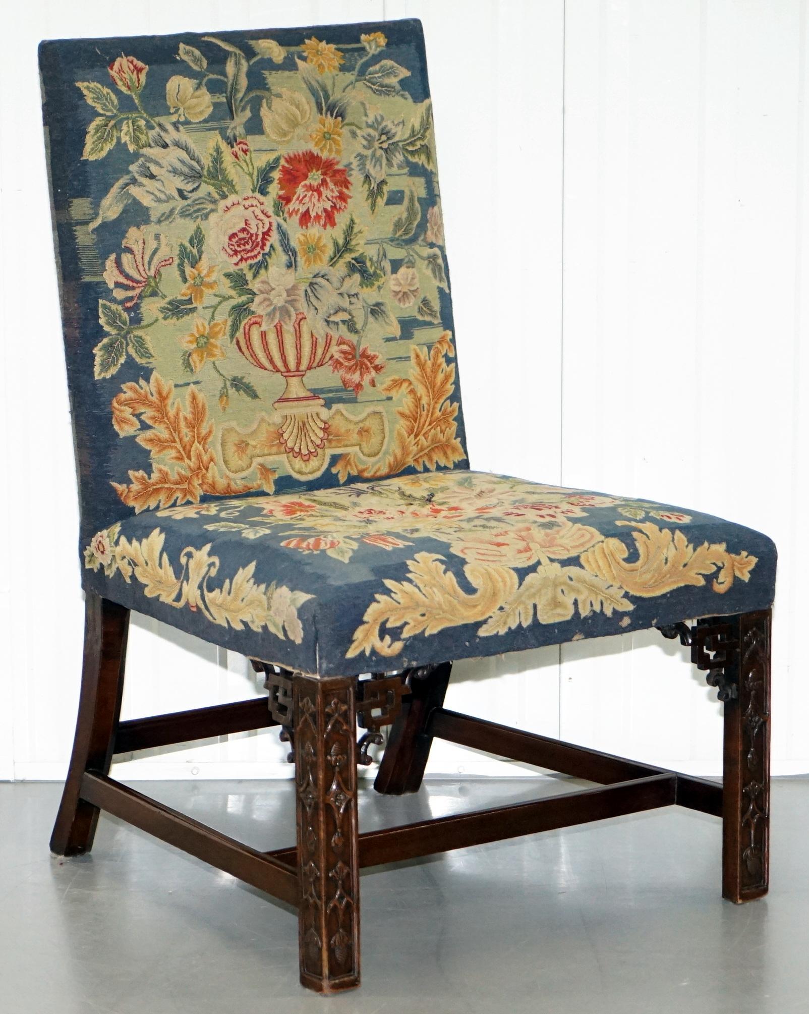 We are delighted to this very rare pair of Thomas Chippendale era circa 1760 Library chairs with period embroidered upholstery 

These are a very rare and highly collectible pair of Library chairs, they were made in the Chippendale era and closely