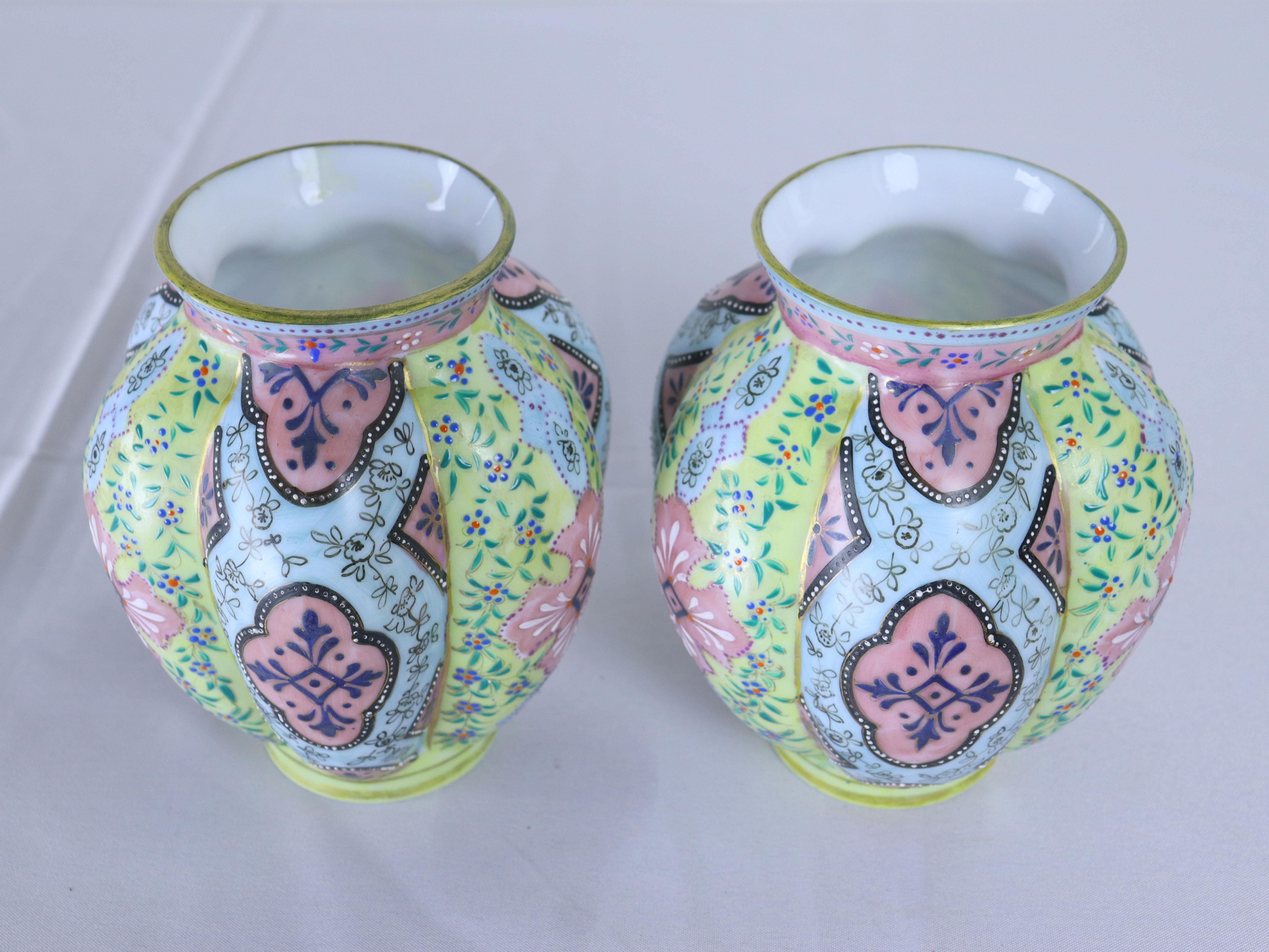 A rare pair of 19th Century enameled opaline glass vases by Thomas Webb in the Morrocan motif.  Beautiful pastel colors, typical of his work.  In good antique condition, no chips.
