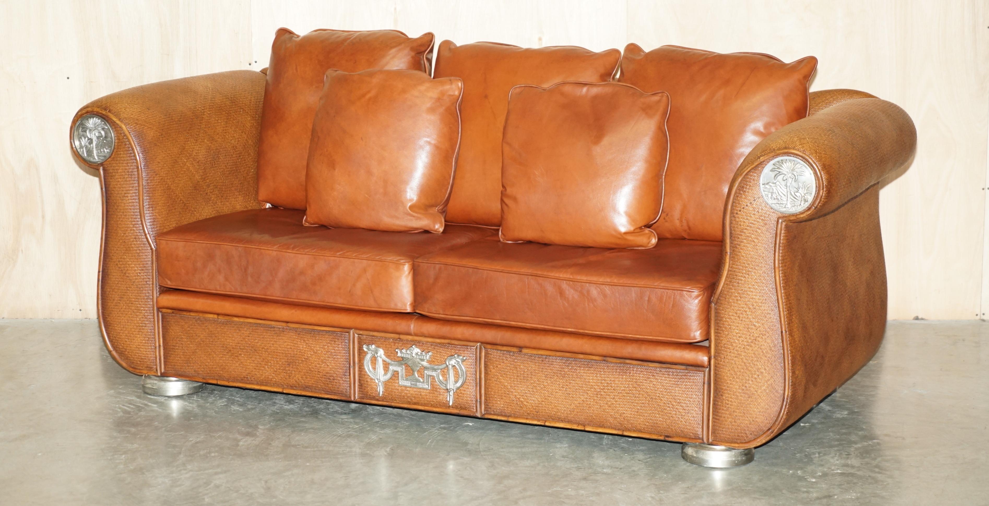 Royal House Antiques is delighted to offer for sale this exquisite pair of Thomasville Safari Collection large three seat sofas with brown leather cushions and woven frames which are part of a large suite 

I have a rather lovely suite of this
