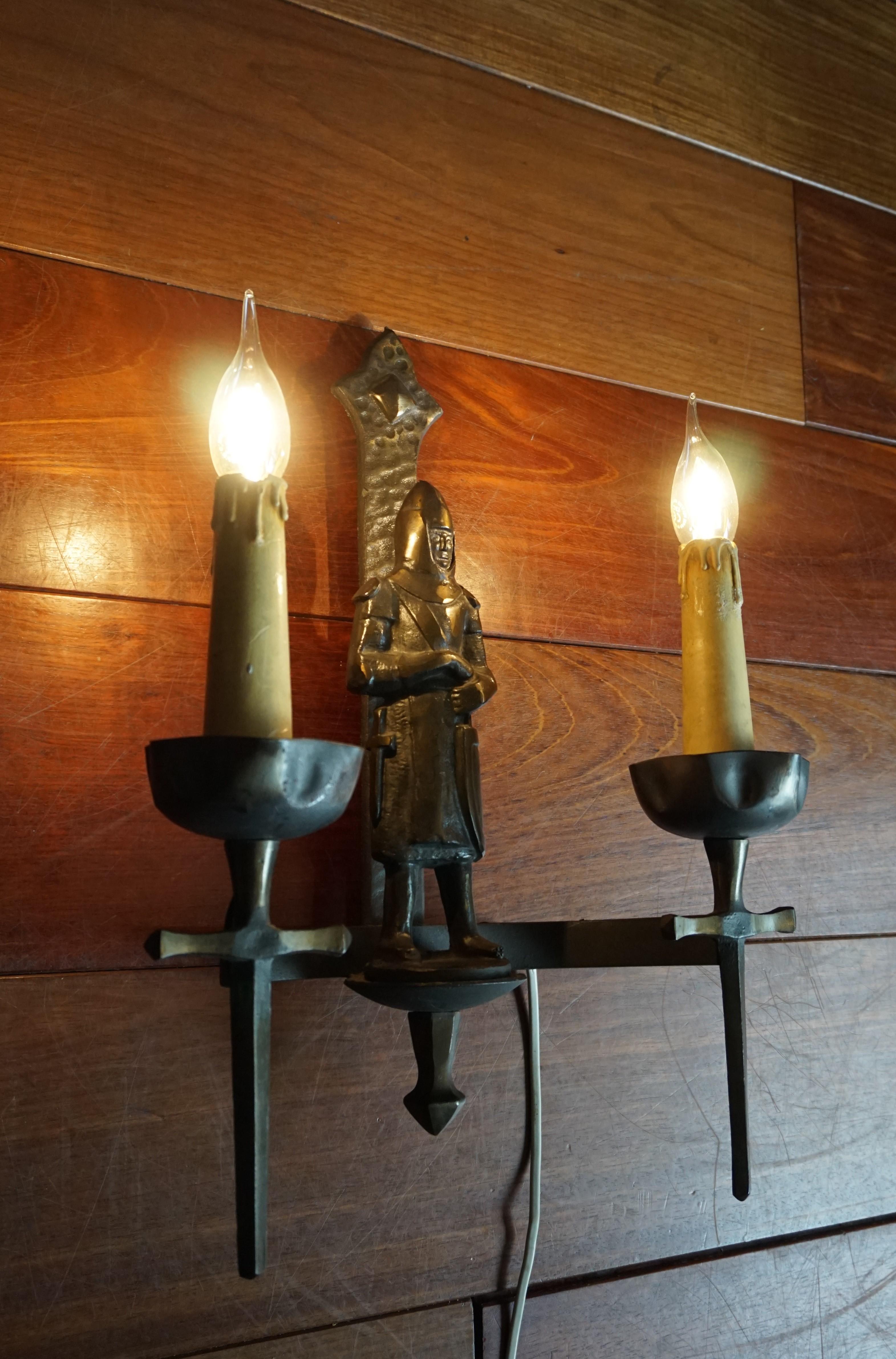 Stylish and highly decorative pair of Medieval Style sconces.

With early 20th century lighting as one of our specialities, we have seen a lot of great and unique fixtures, but never did we come across a pair of handcrafted Mediëval style knight