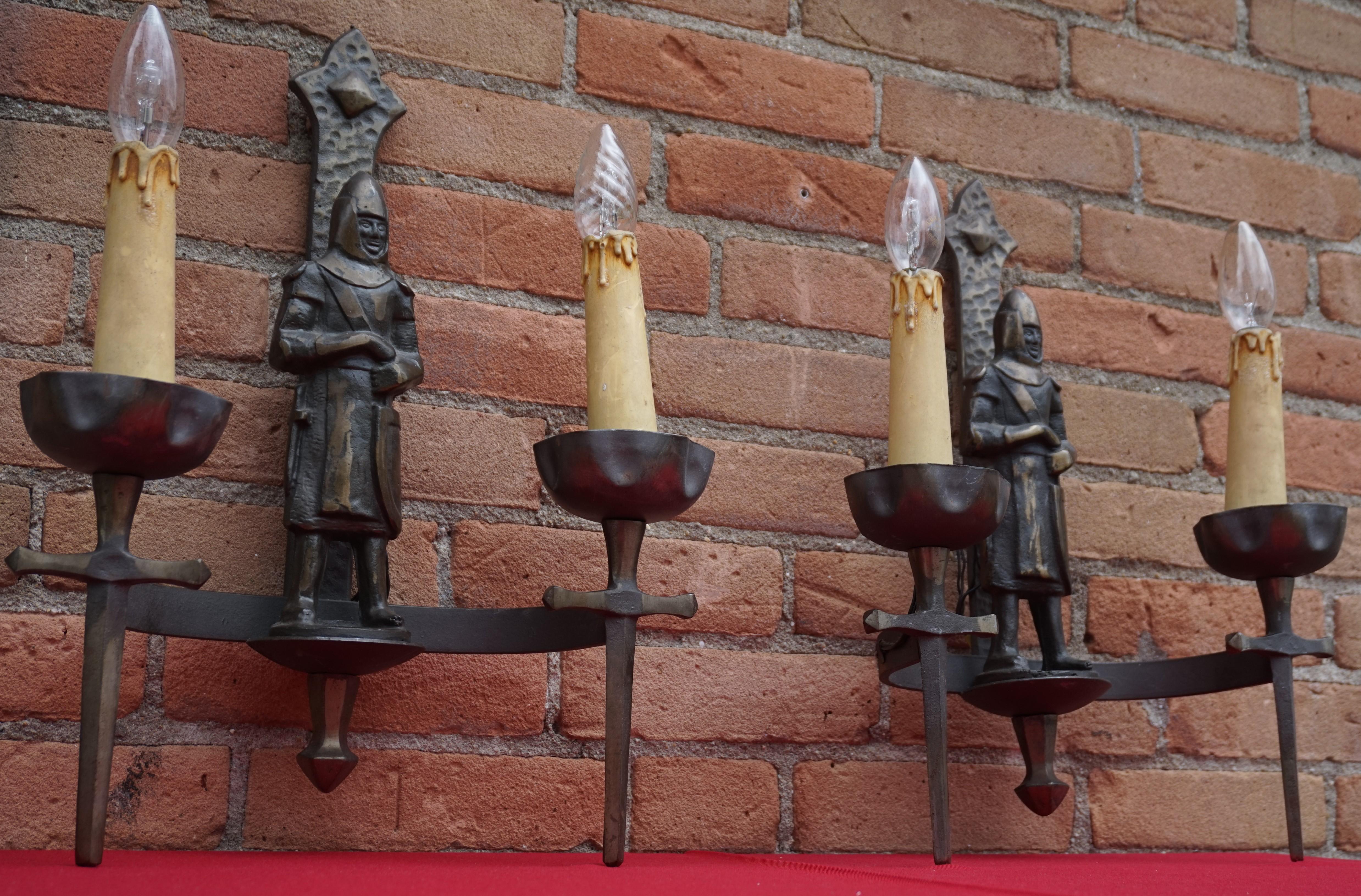 Iron Rare Pair of Two-Light Gothic Revival Bronzed Knight with Swords Wall Sconces