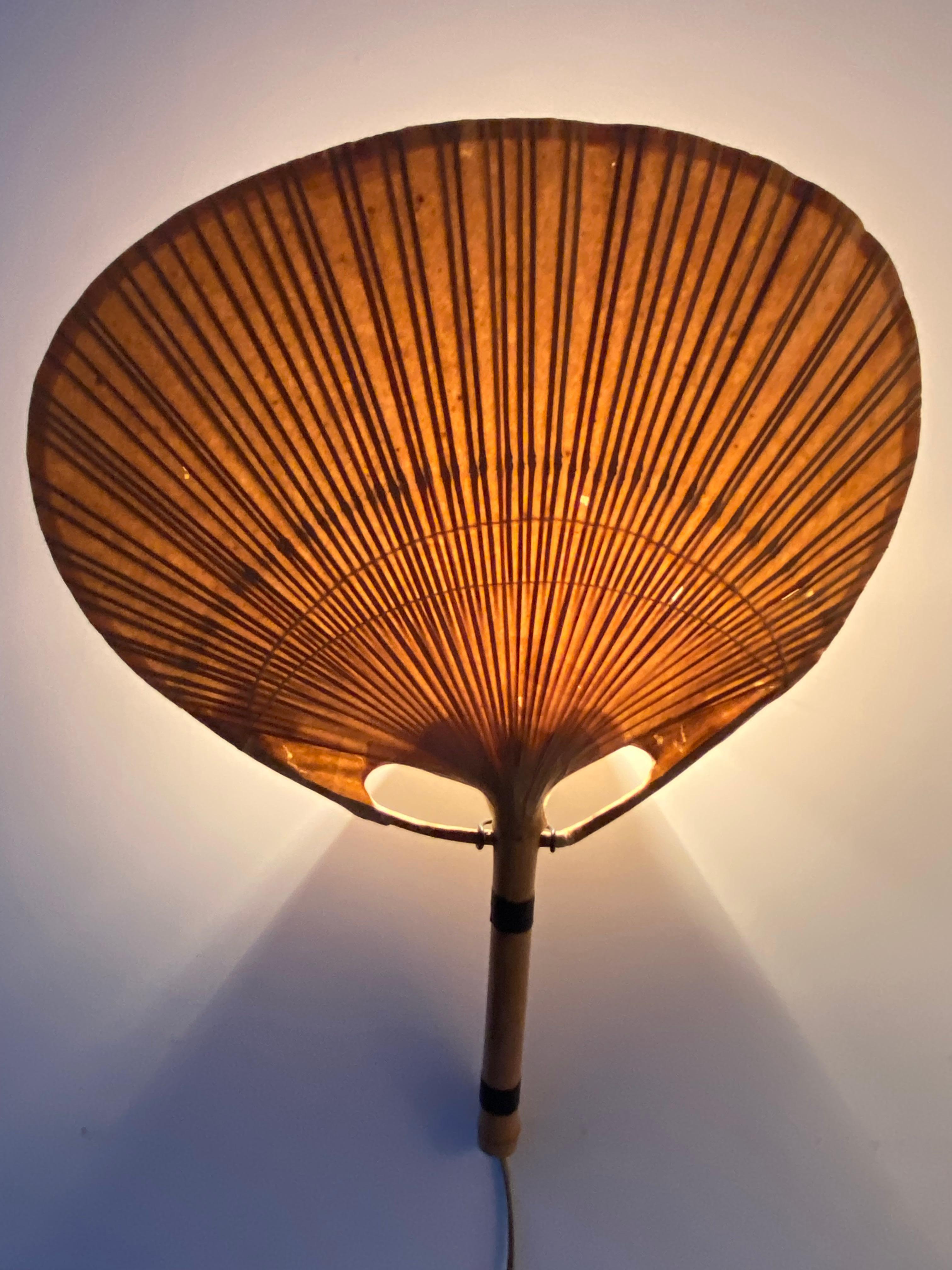 Very Rare Pair of Uchiwa II wall appliques by Ingo Maurer for M-design Munich Germany 1973

The Uchiwa II is the smallest version of the Uchiwa series and gives a very impressive diffuse light when lit. This stunning light was comprised of bamboo