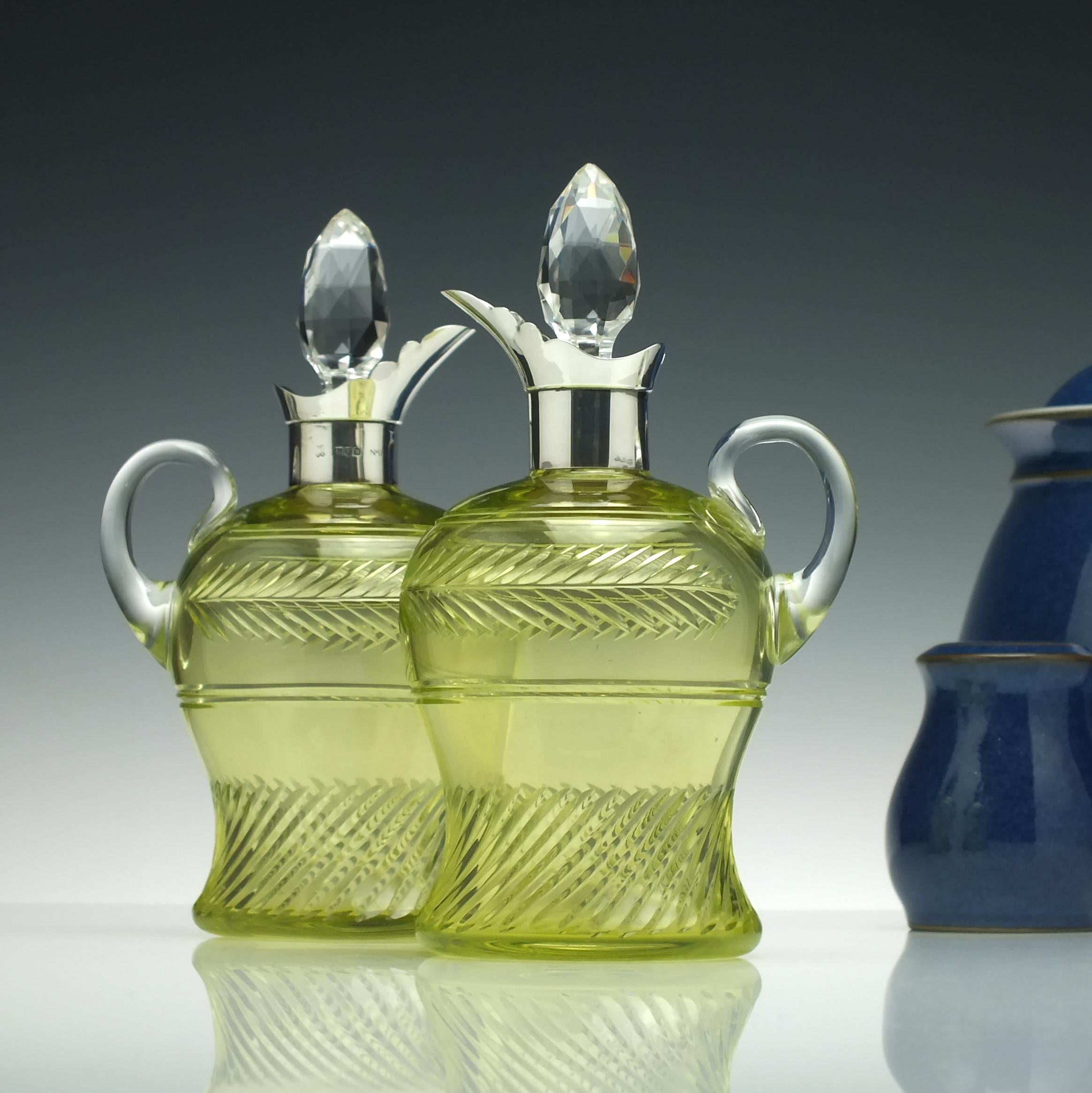 Date & Origin 

London, 1905

Condition

Excellent, no chips cracks or restoration, they are both clean and clear.

Dimensions 

Height 18m, diameter 8.5cm.

Weight

738 grams

Technical description 

A pair of matching claret jugs