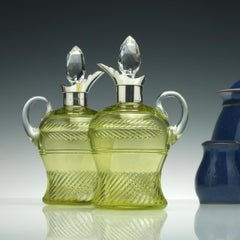 Rare Pair of Victorian Silver Top Vaseline Glass Claret Jugs, circa 1905