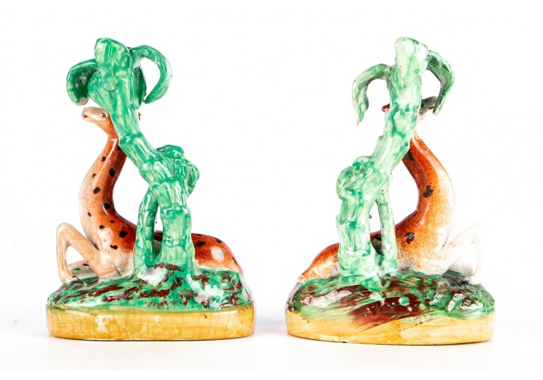 Rare Pair of Victorian Staffordshire Ceramic Recumbent Giraffe Figures In Fair Condition For Sale In Bridgeport, CT