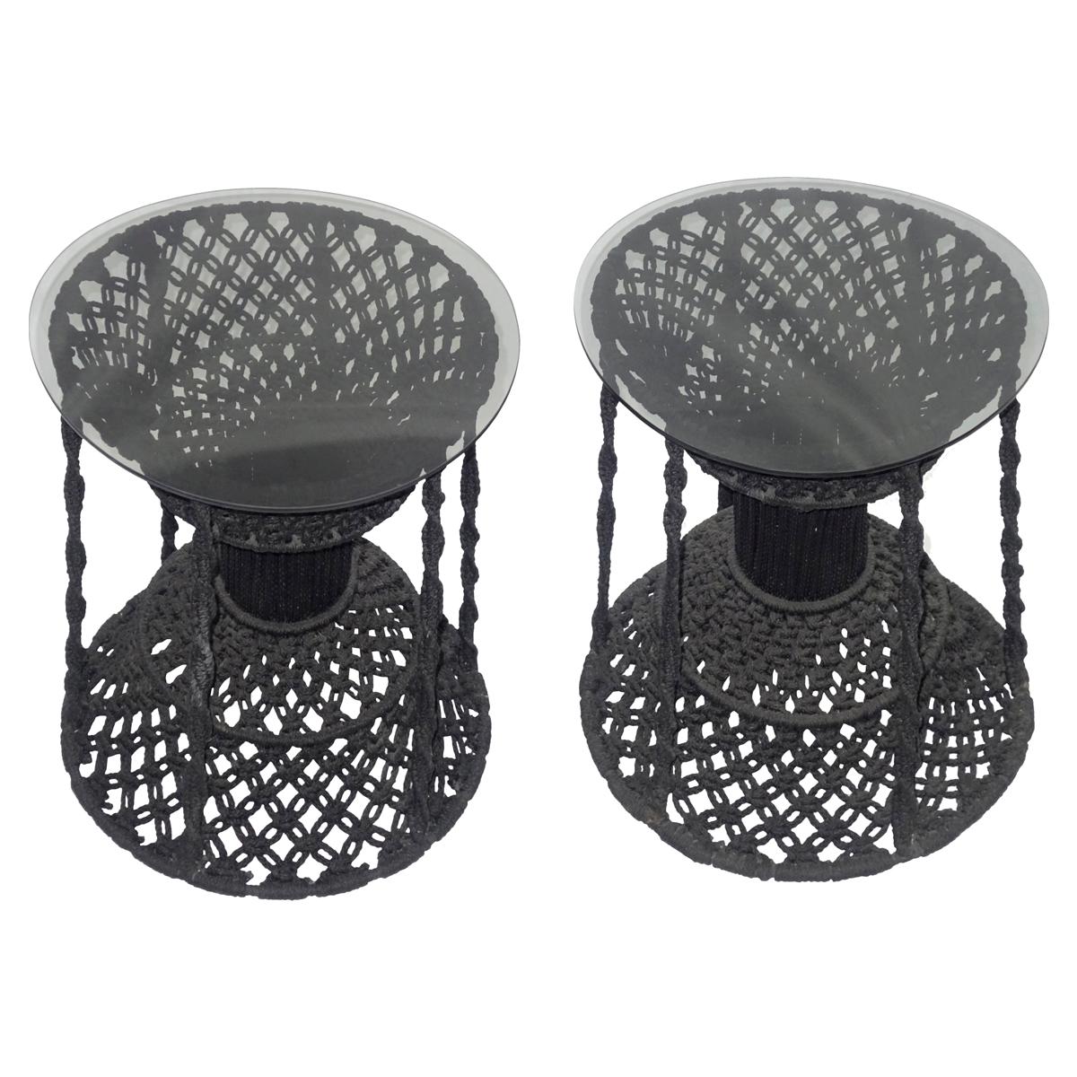 Rare pair of vintage black hand knotted macrame side tables with clear glass tops. Bases are hand knotted wool.