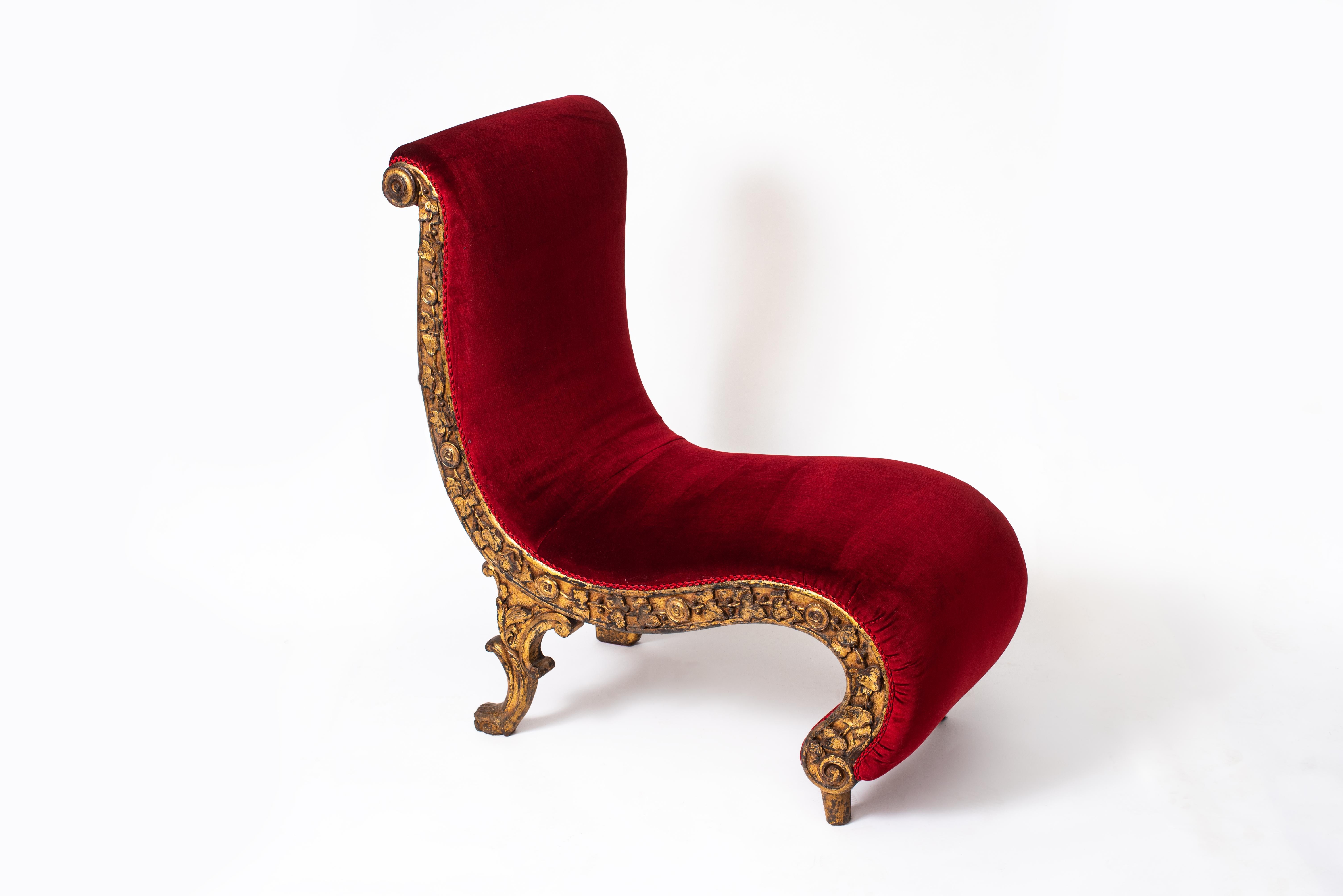 Two very rare love chairs from a Portuguese brothel, circa 1880.

They are in gilded carved wood, the upholstery and the velvet have been completely redone to the original.