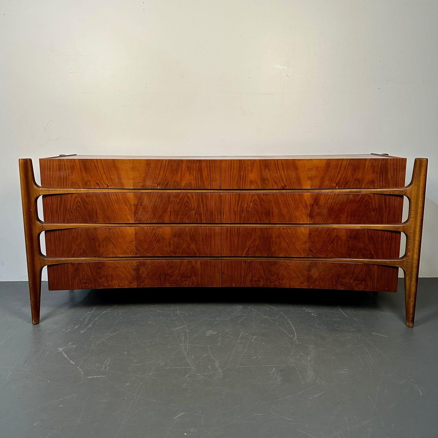 William Hinn, Swedish Mid-Century Modern, Sculptural 'Exoskeleton' Dressers, 1960s

Rare compatible pair of Exoskeleton dressers designed by William Hinn and produced in Sweden circa 1960s. Concave sculpted front design with edge mounted legs.