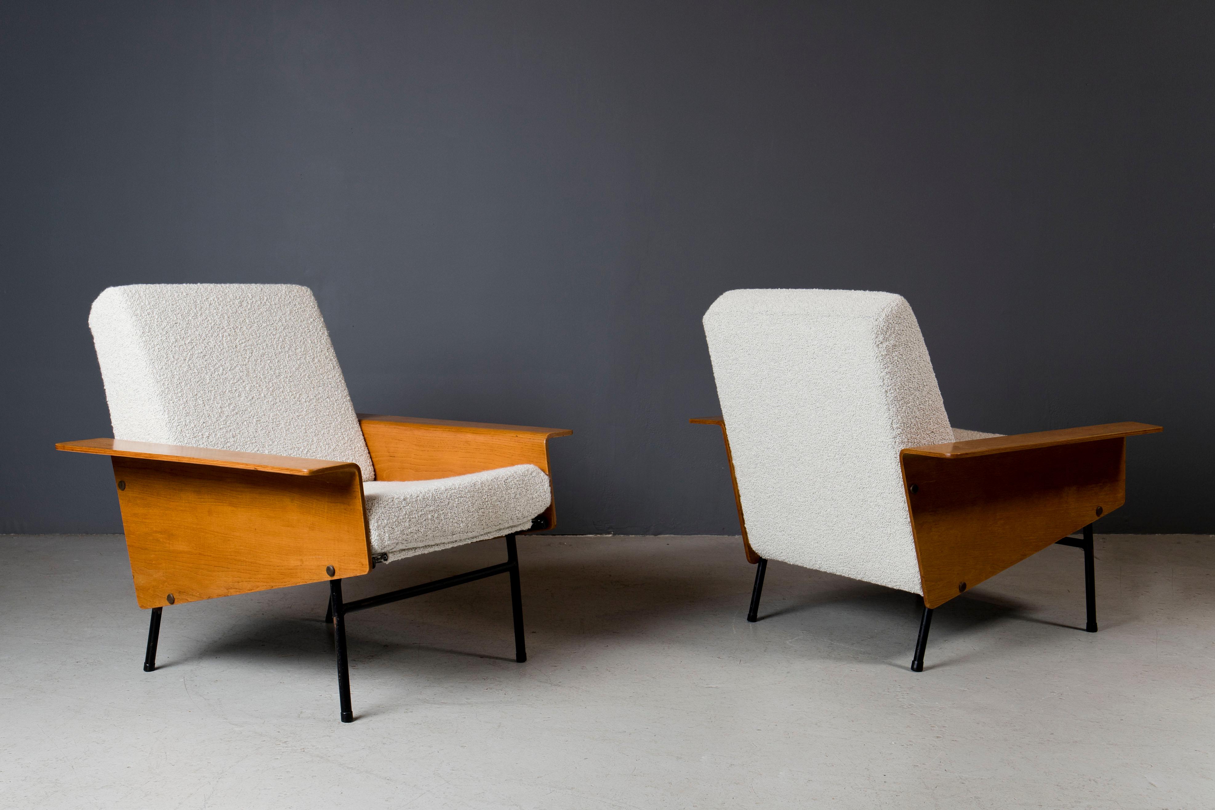 Lounge chairs, designed by Pierre Guariche for Airborne in bent plywood, iron and upholstery.
This model was produced only for two years.
Chairs are in great original condition, cream boucle upholstery is new.
 