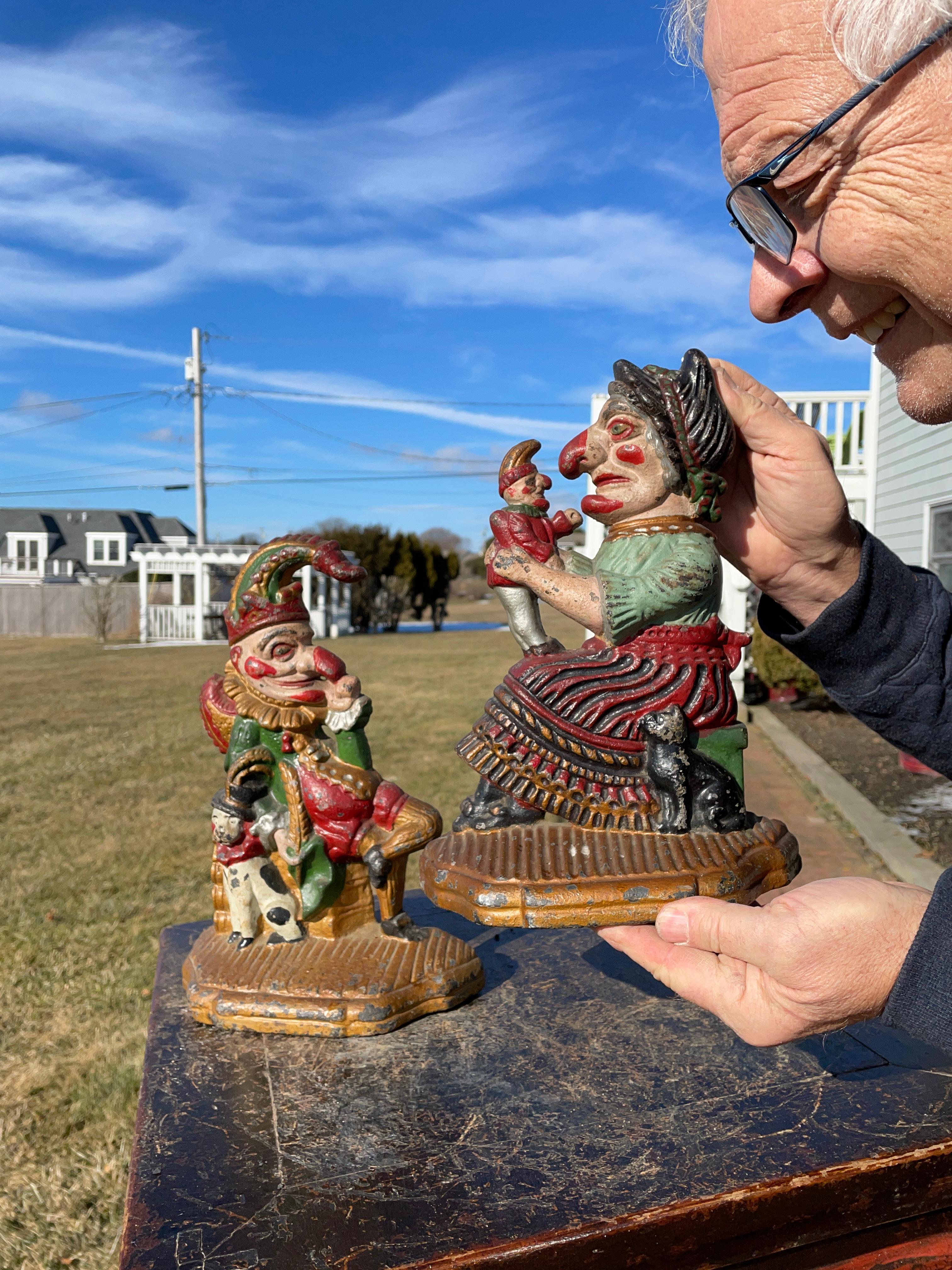 Nostalgic opportunity- large matched set (2) cast iron doorstops of Punch and Judy depicting Punch with his dog and Judy with her beloved puppet, both in original hand painted patinated colors.

Punch and Judy was a traditional and popular puppet