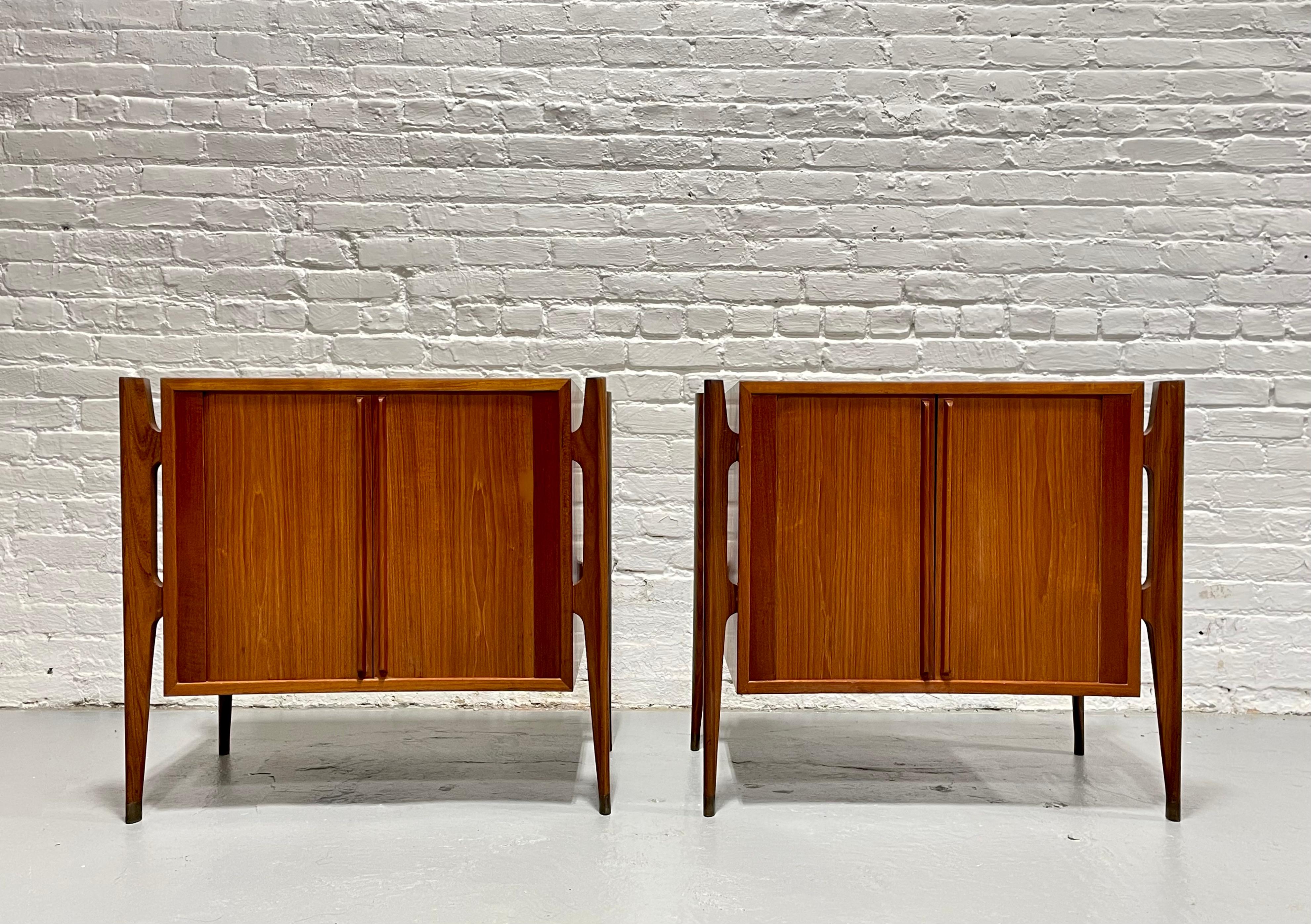 Rare Pair of Teak Exoskeleton Tambour Door Nightstands designed by Jorgen Clausen Brande Møbelfabrik, Denmark c. 1950. Hands down the nicest pair of nightstands we’ve had in our shop. From the sculpted leg framing to the smooth tambour doors, these