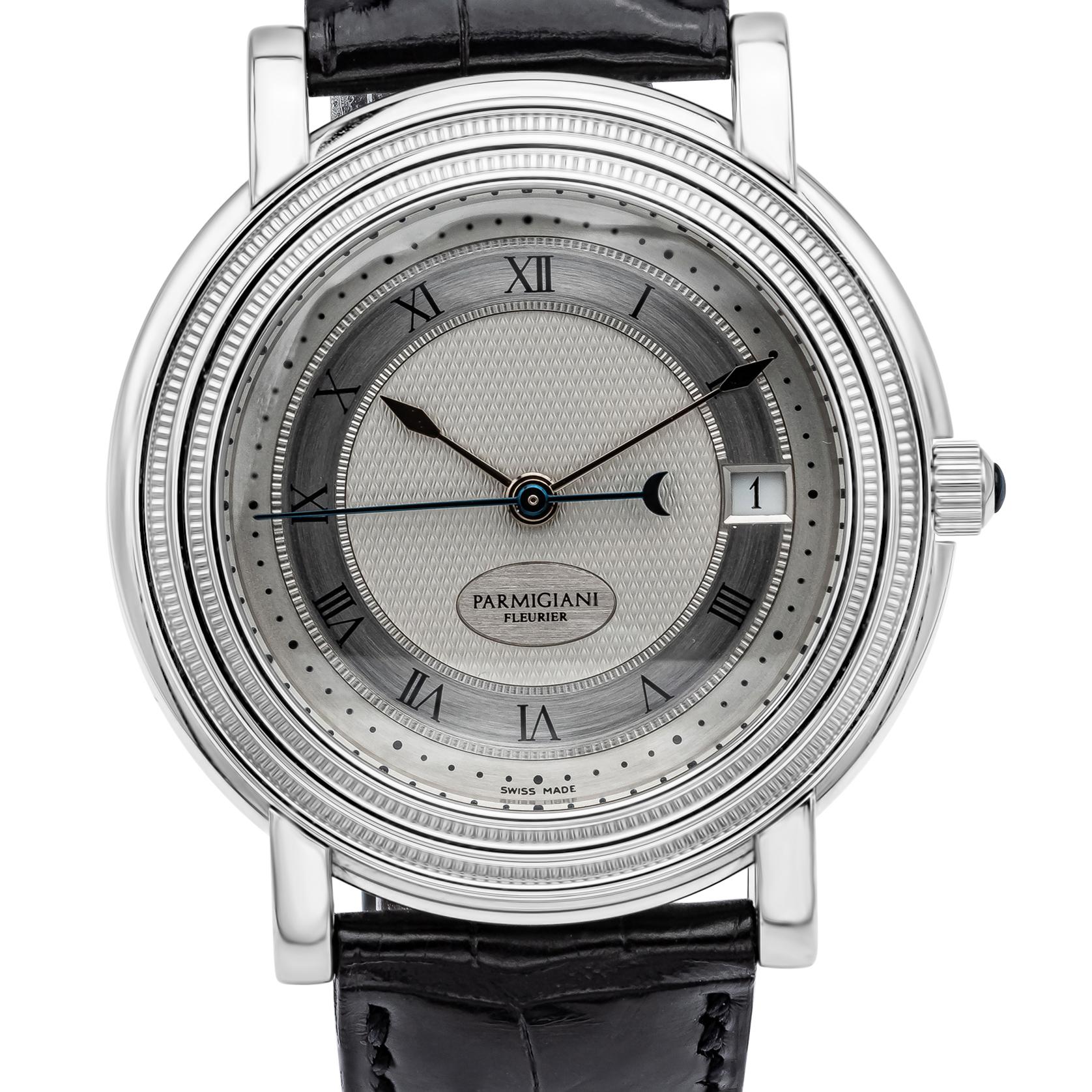 SIgned Parmigiani Fleurier Toric Model Ref C00700. 
Showcasing a 40mm case with a silver dial finished with a guilloche design. 
Features Javelin-style hands, sweep centre seconds, date window, in large circular case with stepped and ribbed