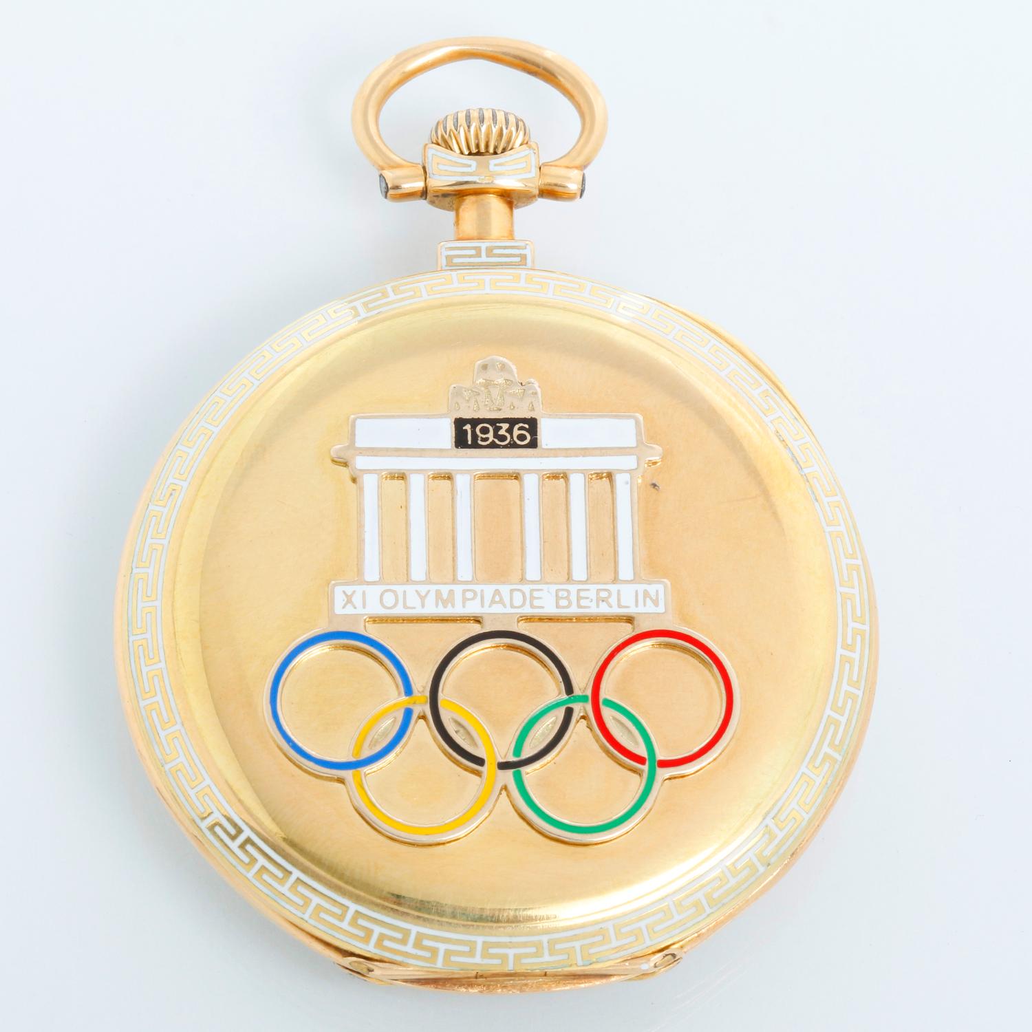 Rare Patek Philippe 18K Yellow Gold Pocket Watch Commemorating The 1936 Berlin Olympics - Manual winding. 18K Yellow gold hdeinged case  with White enamel Greek key and Olympic rings and Brannburg Gate on the back  ( 48mm ). White enamel dial with