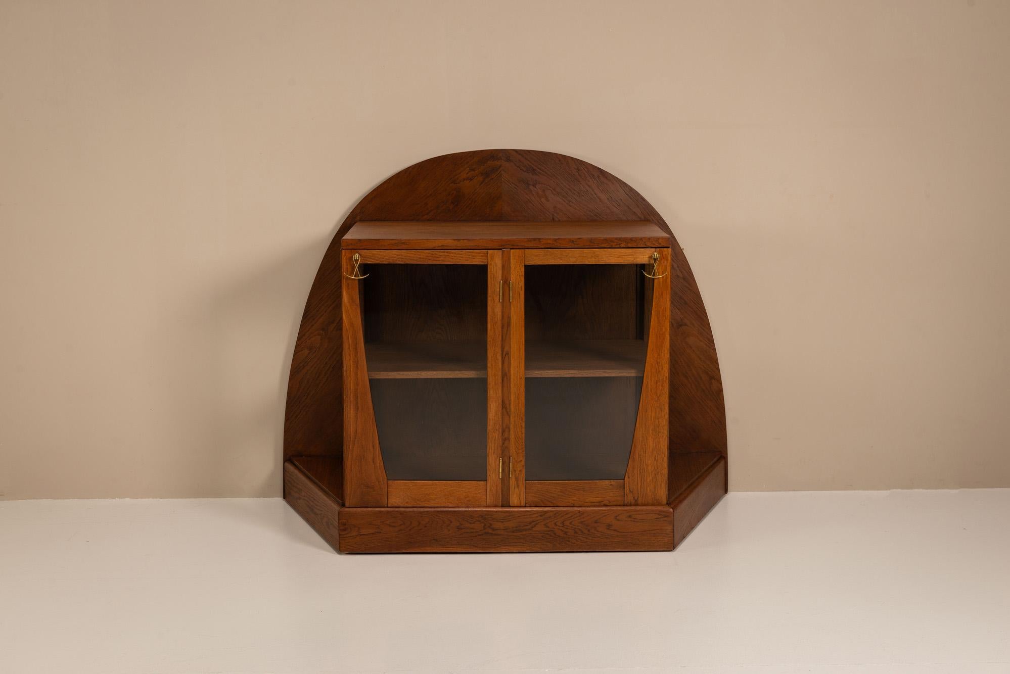 A rare expression of Dutch design ingenuity, this tea cabinet by Paul Bromberg exemplifies the progressive spirit of early 20th-century interior design. Created in 1918, it features prominently on the cover of the book 'Paul Bromberg –