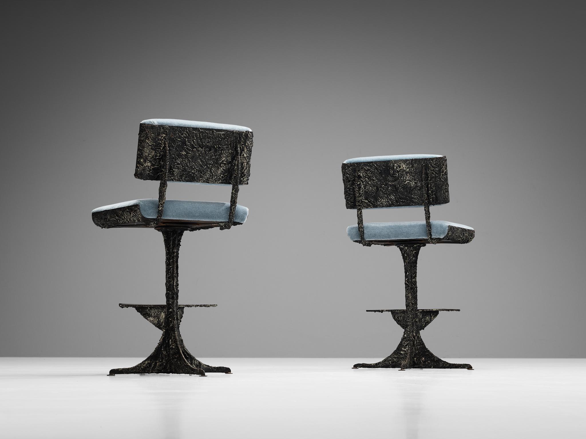 Paul Evans for Directional, pair of barstools from the Bronze series, epoxy bronzed resin over steel, reupholstered mohair, United States, circa 1975

This rare pair of swivel barstools is designed by Paul Evans for Directional. Evans employed the