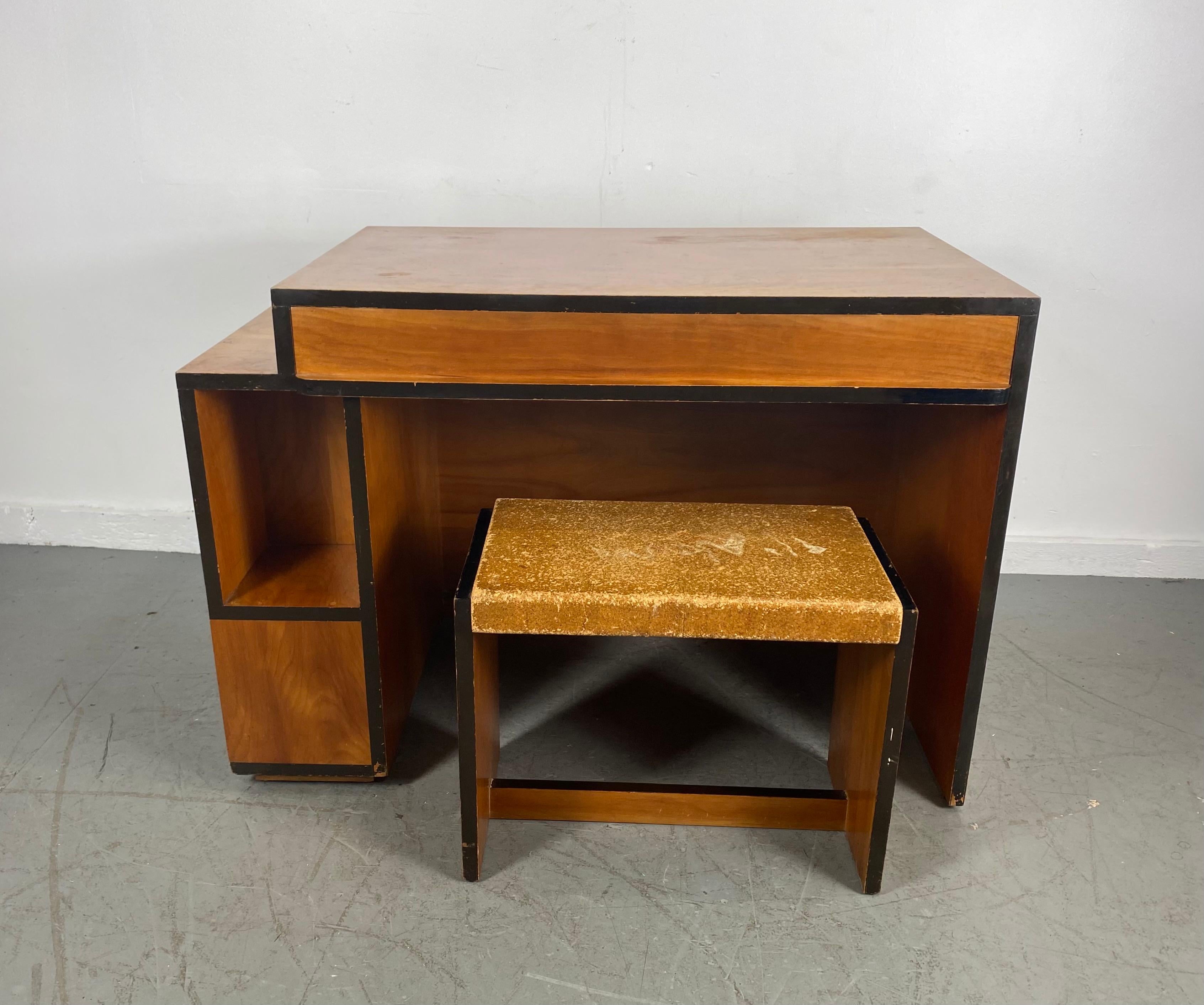 Stunning and rare bookcase desk and cork top seat designed and manufactured by Paul Frankl, I believe this was a transitional piece designed and built in the mid 1930s, stunning design, looks amazing from any angle, complete with original cork top