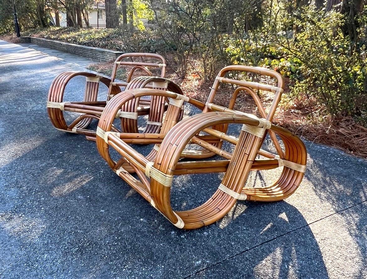 An absolutely jaw-dropping pair of rare, meticulously restored Art Deco five (5)-strand Pretzel loungers, circa 1950. Matching three-seat sofa available in a separate listing. The pair have mellowed to a fabulous Peanut tone. While unmarked, these