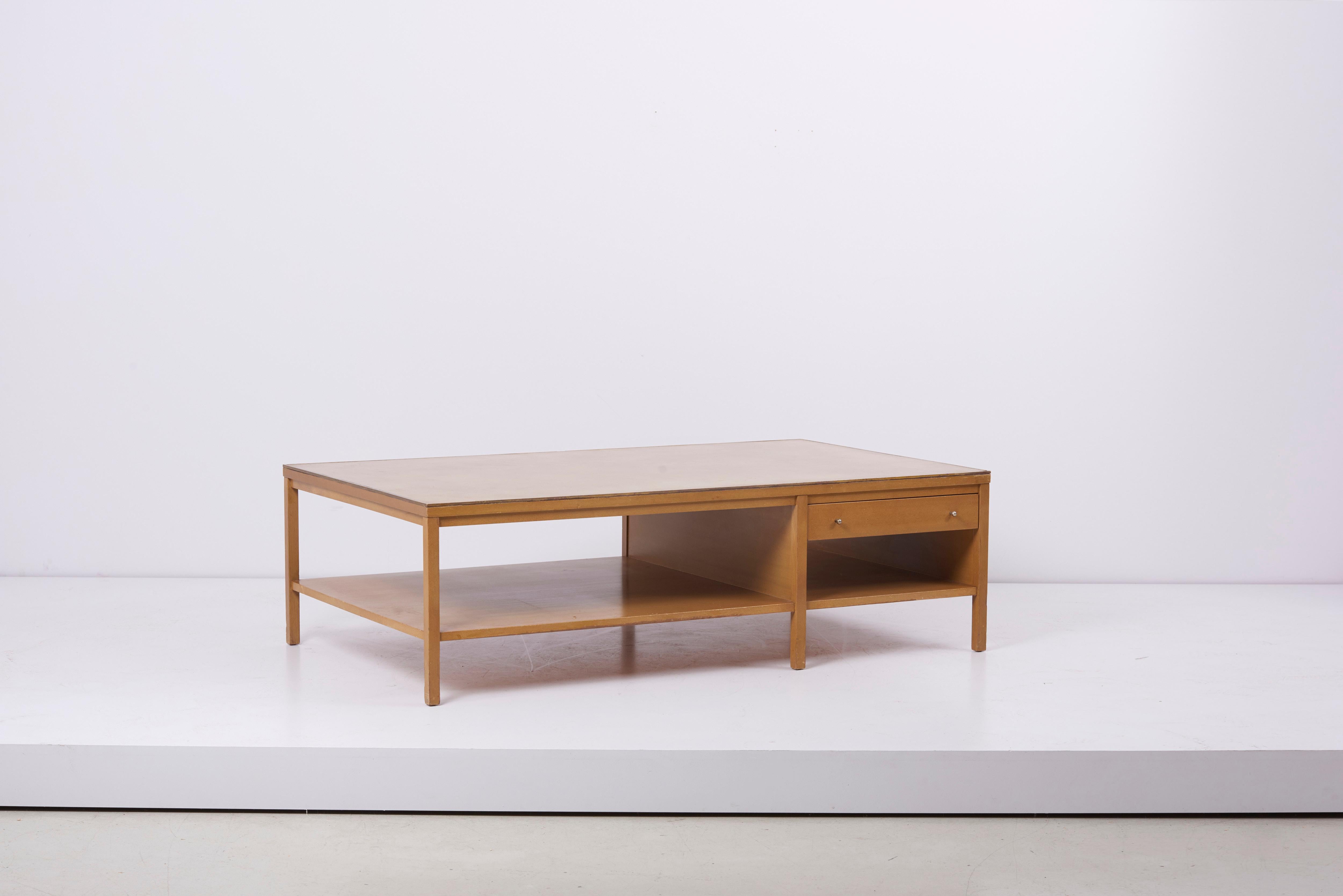 Rare Paul McCobb coffee table with leather top for Calvin
Rare Paul McCobb coffee table with leather top for Calvin. Legs show some wear of usage, but in overall good condition.

 