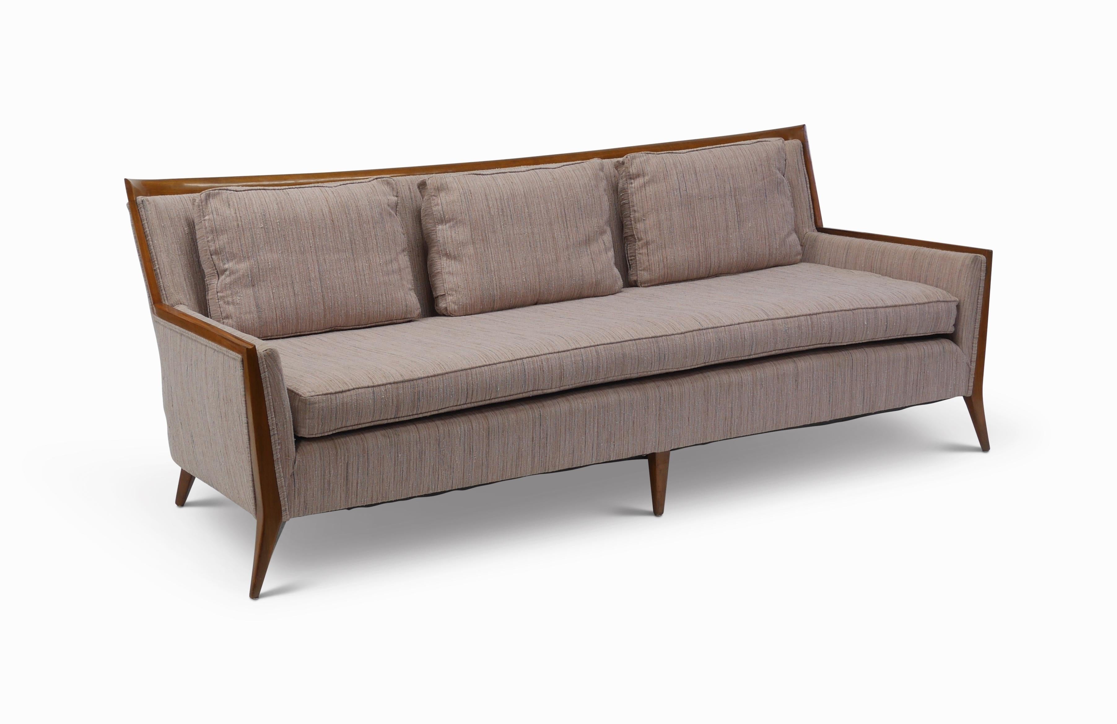 Rare to market Paul McCobb for Directional sofa # 407.
Model 407 was manufactured in small numbers due to the complexity and expense of the exposed walnut frame. The design encompasses many of the tenants of McCobb's design ethos, undeniably modern