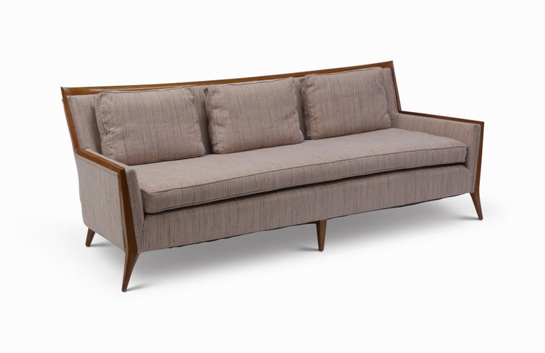 Rare to market Paul McCobb for Directional sofa # 407.
Model 407 was manufactured in small numbers due to the complexity and expense of the exposed walnut frame. The design encompasses many of the tenants of McCobb's design ethos, undeniably modern