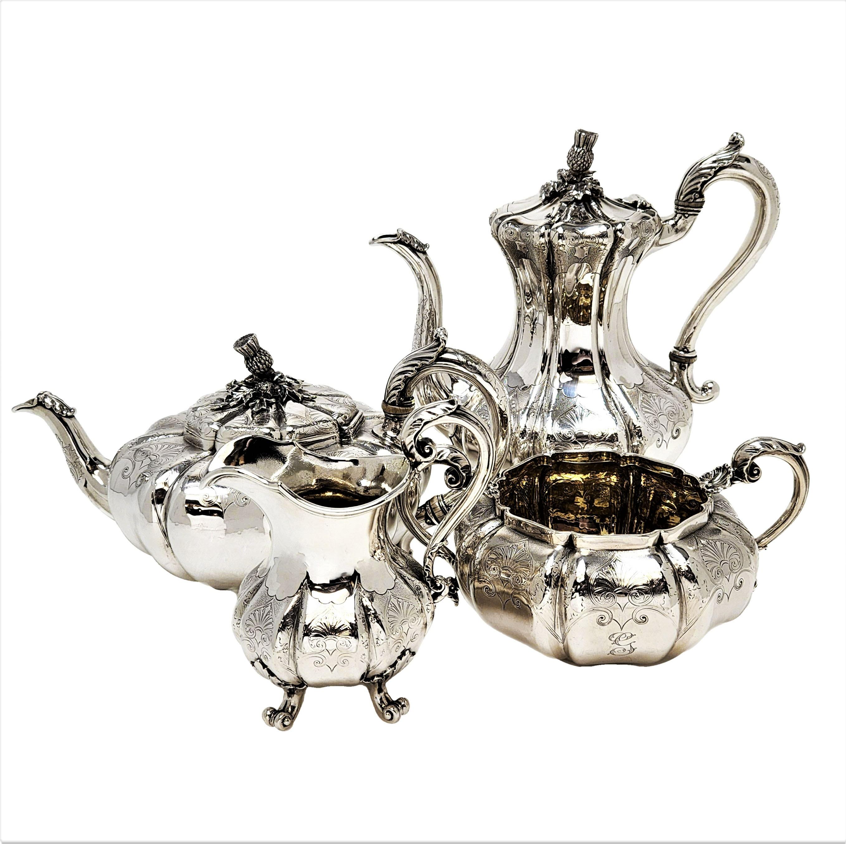 A beautiful Antique Solid Silver four Piece Tea and Coffee Set by the esteemed silversmith Paul Storr. This rare complete four piece set has a subtle lobed shape and each piece has a detailed engraved pattern around the upper portion of the body and