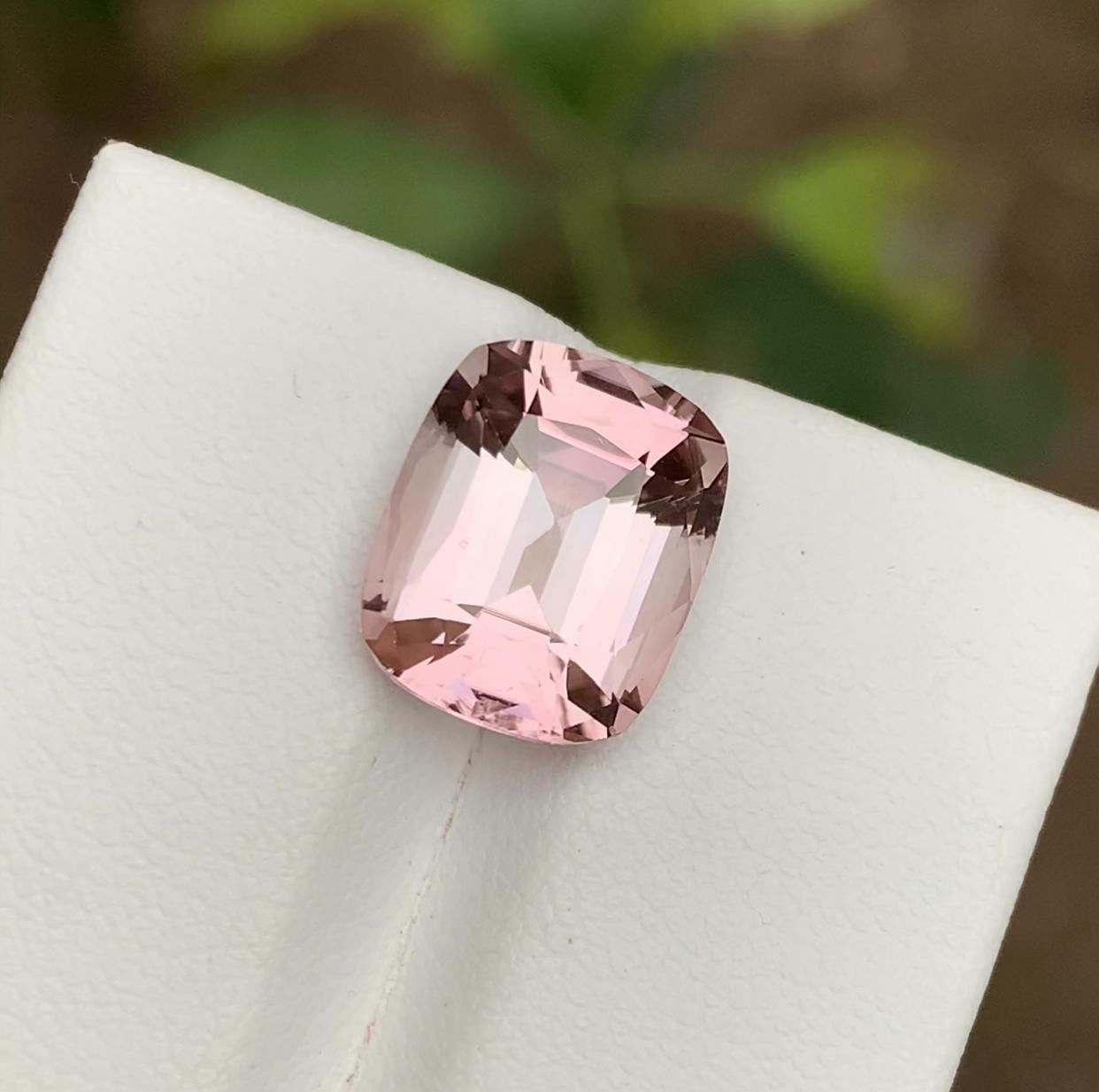 GEMSTONE TYPE: Tourmaline
PIECE(S): 1
WEIGHT: 5.70 Carat
SHAPE: Cushion 
SIZE (MM): 12.18 x 10.00 x 6.75
COLOR: Pink
CLARITY: Eye Clean
TREATMENT: None
ORIGIN: Afghanistan
CERTIFICATE: On demand

This stunning pink tourmaline gemstone boasts a