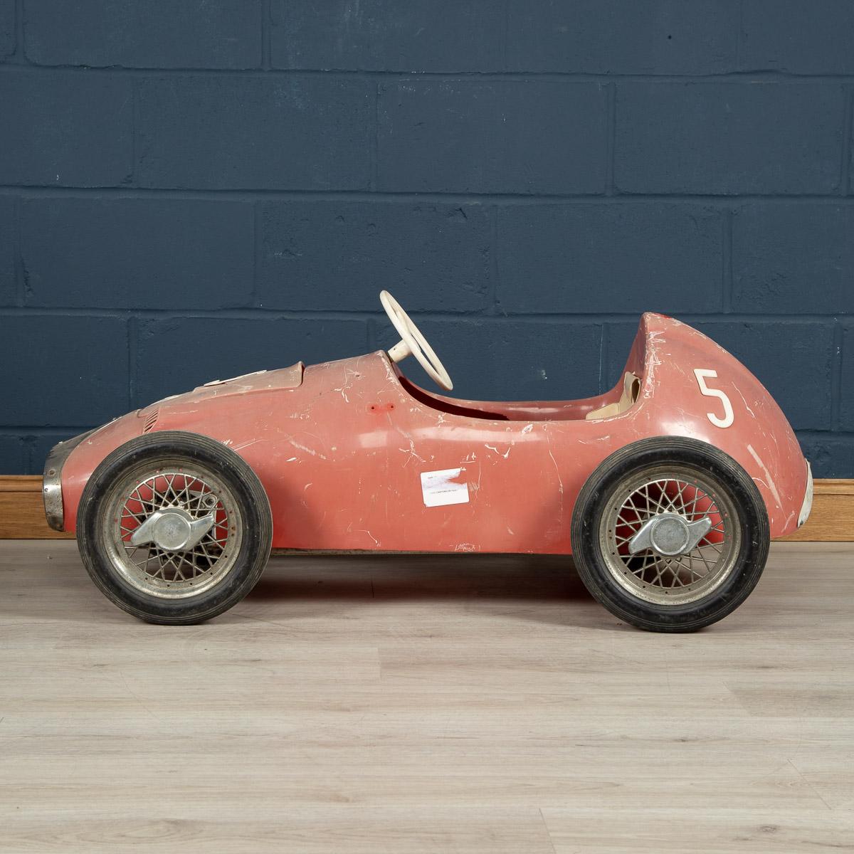 A pedal car, metal and fiberglass construction. Well used but oozes plenty of charm, honest and unrestored pedal car, “Carrara” model, was realized by the world famous Pines Factory in Italy in the 1960s.
 
 
   