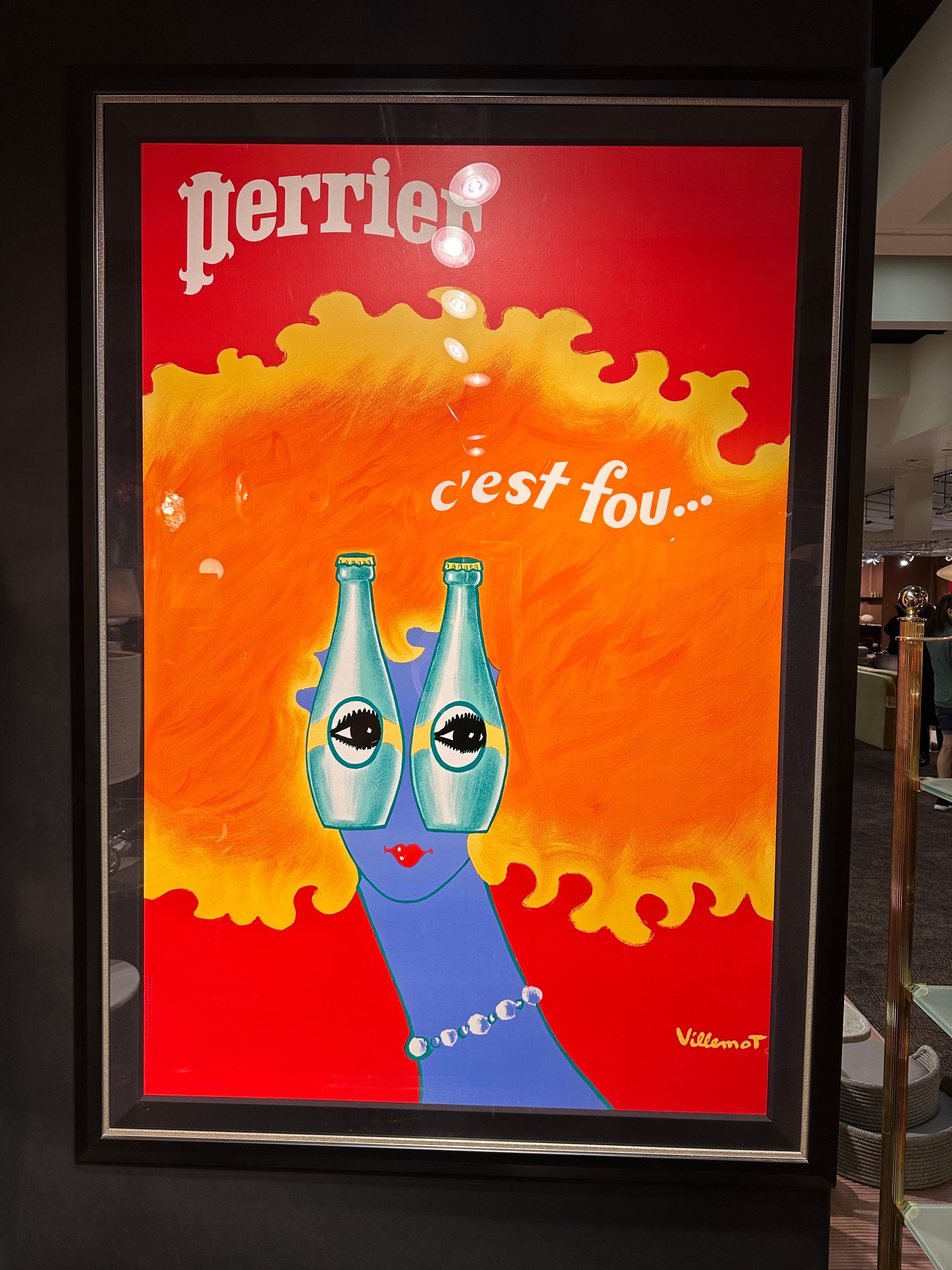 Rare framed “Perrier” poster by French artist Bernard Villemot. Poster is linen backed and framed under protective acrylic sheet. Frame is matt black with silver trim.