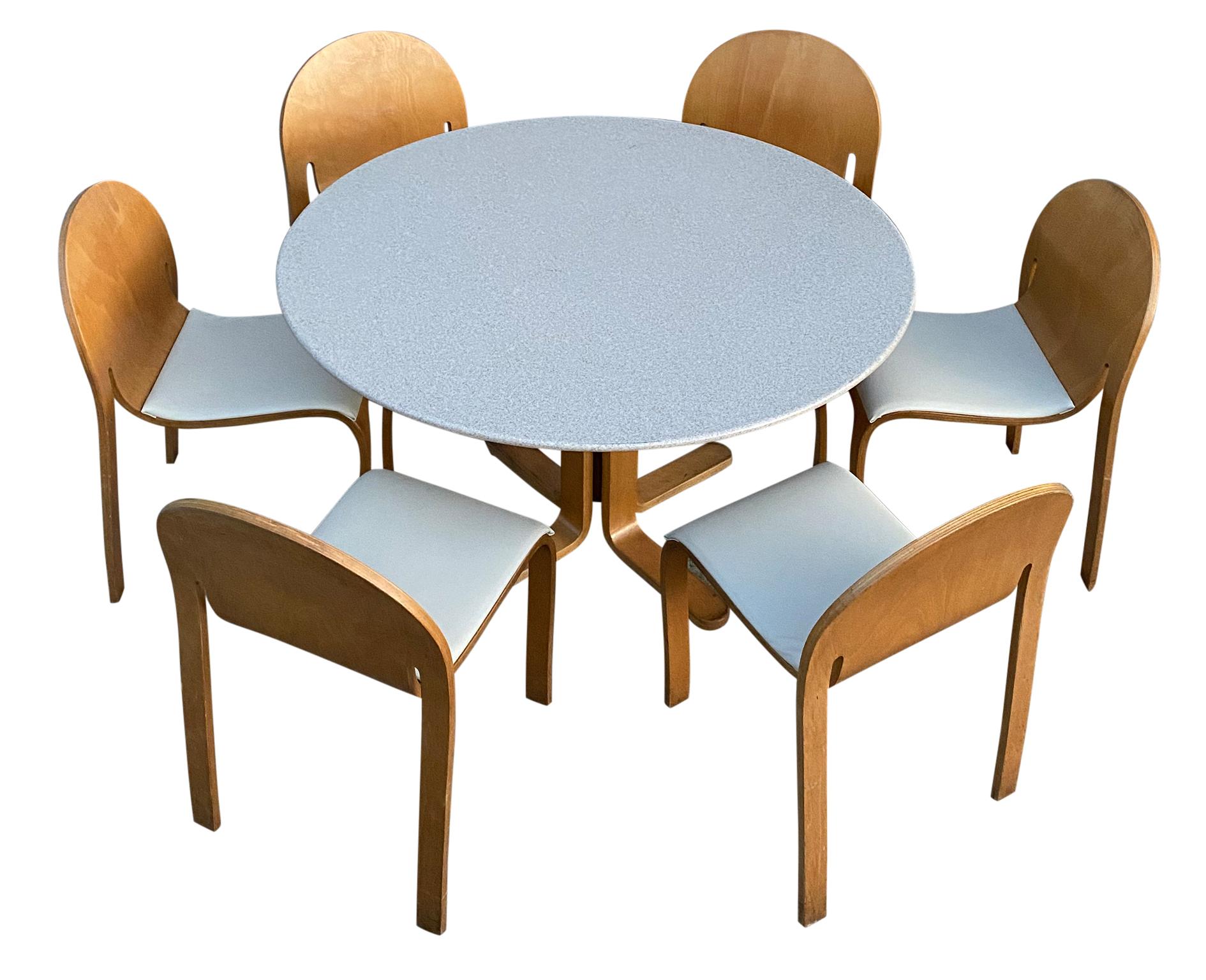 Peter Danko design Mid-Century Modern dining table set with (6) matching chairs bent Molded wood. (6) Very unique Bodyform side chairs upholstered in a beige Vinyl. Along with a Peter Danko Circular that is made of a faux stone sand beige top with