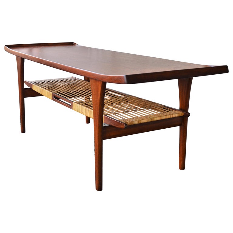Rare Peter Lovig Nielsen Teak Coffee Table, Flared Ends and Cane Wrapped Shelf For Sale