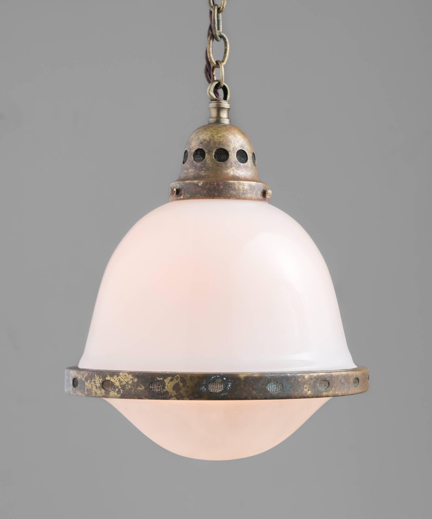 Rare Petite Peter Behrens Pendant, circa 1920

Unique, petite form with Opaline Glass shades secured by a patinated brass brace. Manufactured by AEG Siemens.

Overall height adjustable.

