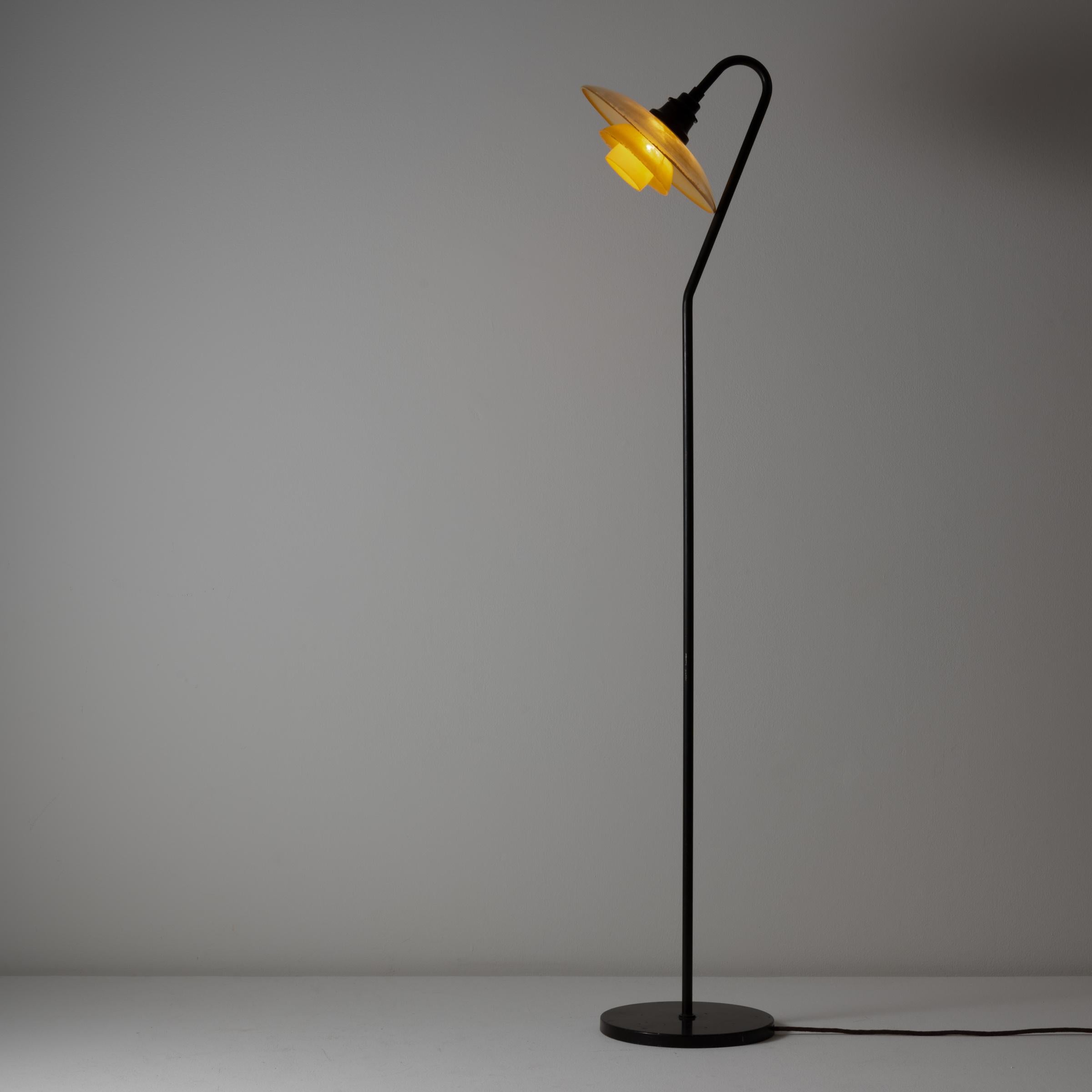Rare PH 3/2 Floor Lamp by Poul Henningsen. Designed and manufactured in Denmark, 1931. Amber glass shade with original stamp, metal base and stem, original cord. We recommend one E27 100w maximum bulb. Bulbs not provided.