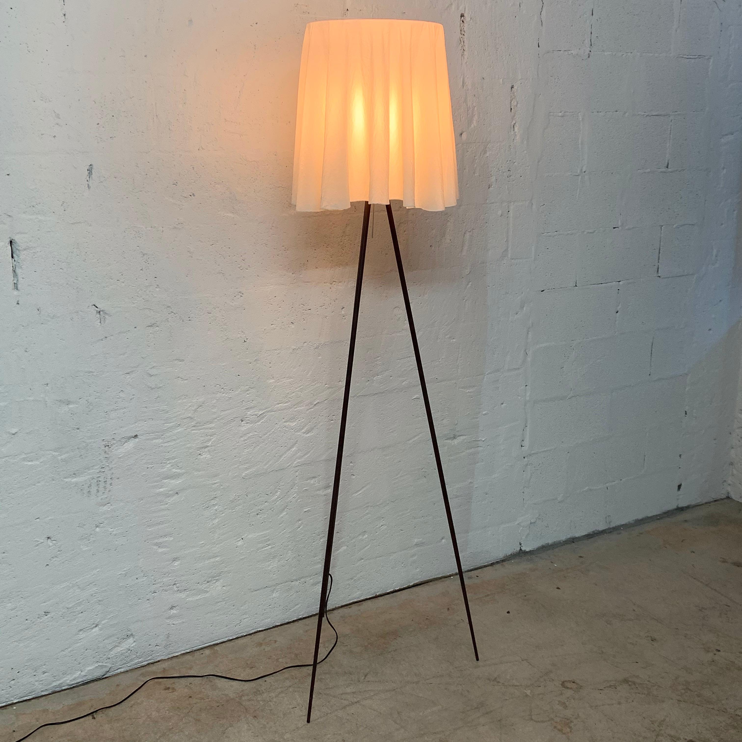Rosy Angelis Postmodern tripod floor lamp rendered in aluminum with a rare brown finish complimented with a poly silk fabric diffuser, embroidered with Starck signature. Designed by Philippe Starck for Flos lighting, Italy, 1990s.