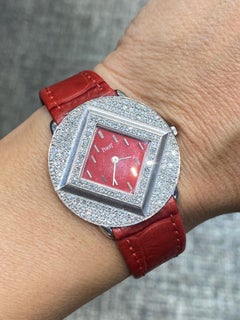 Rare Piaget red dial white gold and diamond watch