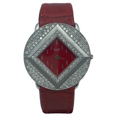 Rare Piaget red dial white gold and diamond watch