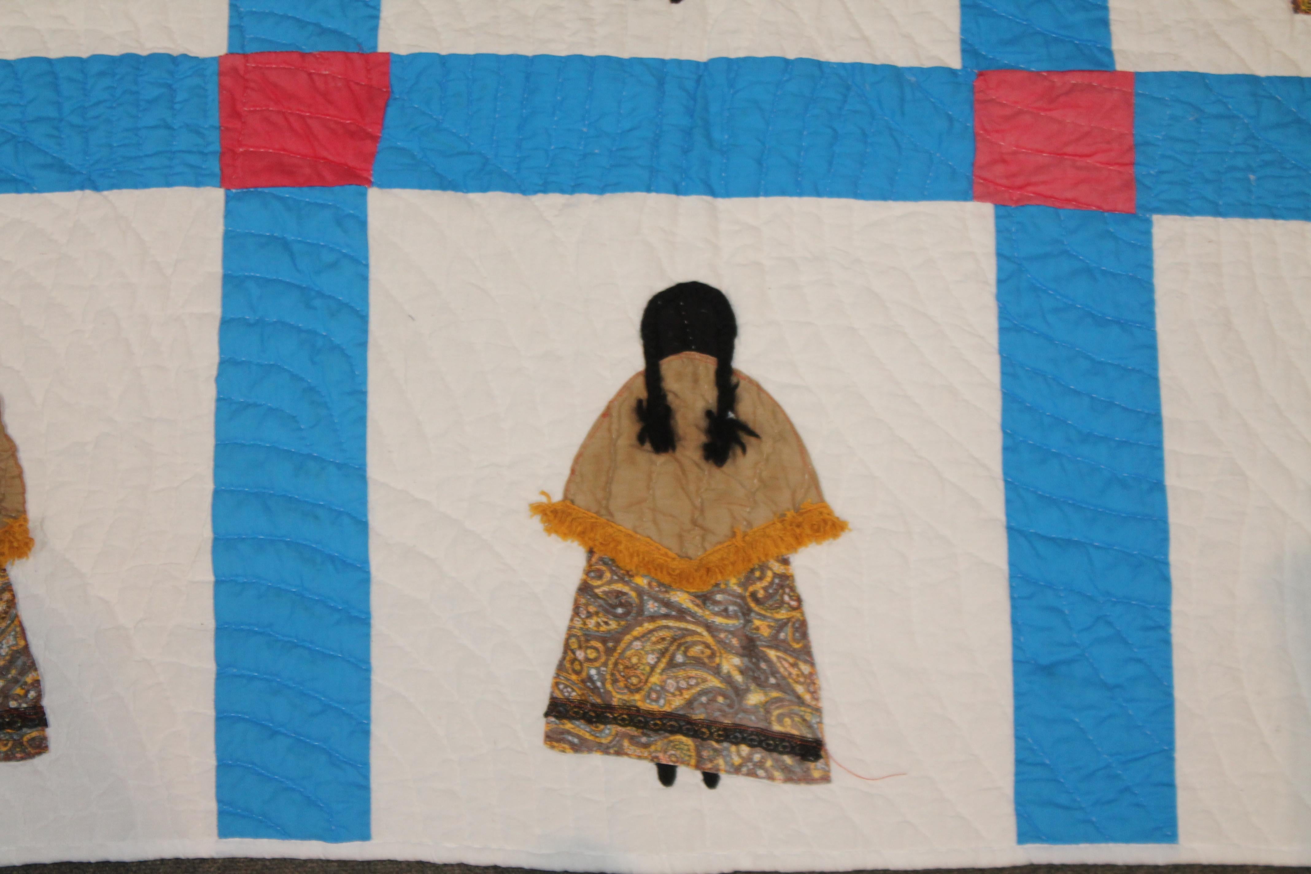 This folky Indian girl applique quilt is quite unusual and is in south western colors too. Great addition to any quilt of Folk Art collection. The condition is very good.