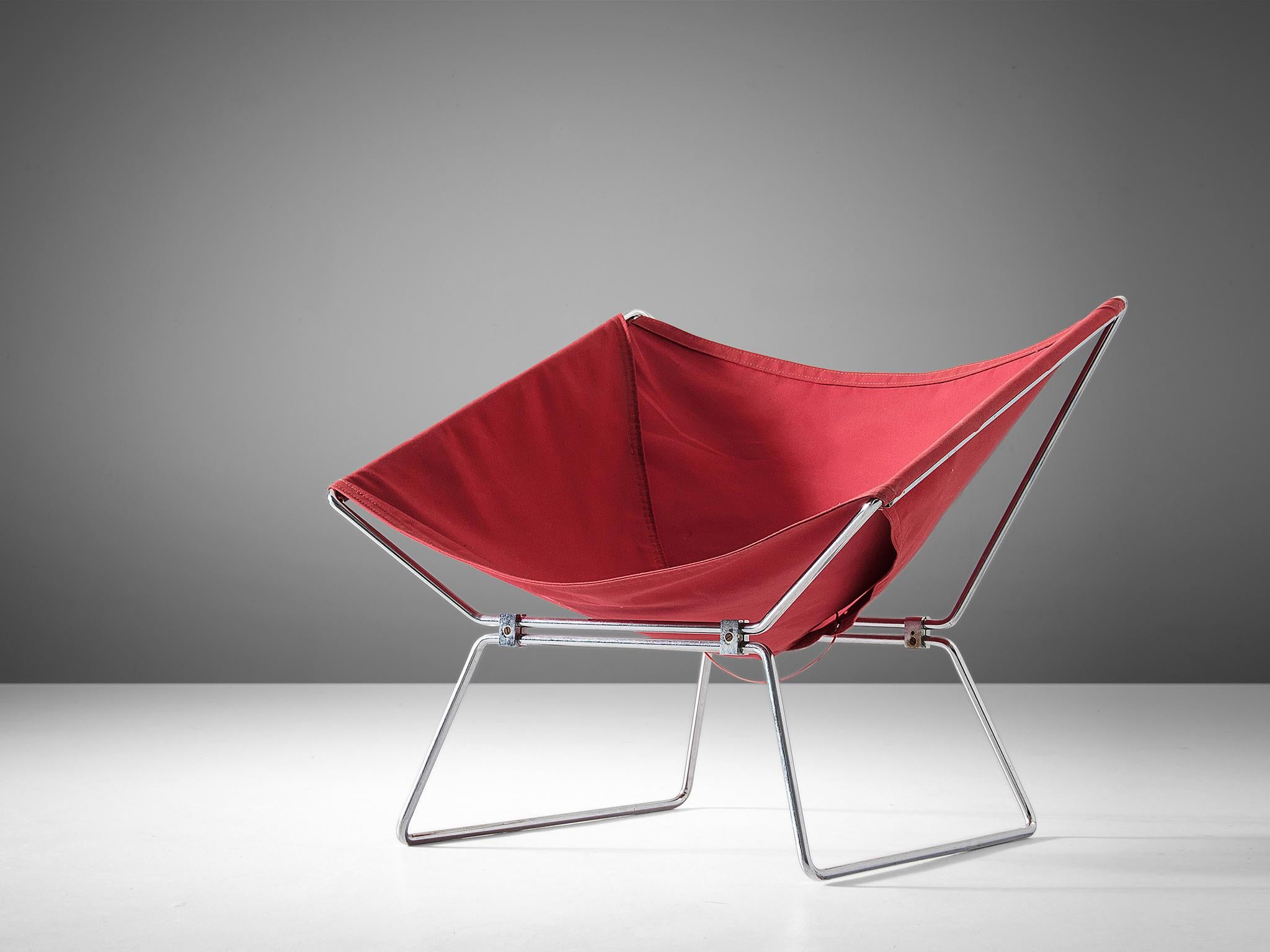 Easy chair model AP14, in canvas and steel, by Pierre Paulin for AP Originals, the Netherlands, 1954.

Very rare easy chair in original red canvas upholstery. This chair was designed by French designer Pierre Paulin for the A. Polak, a Dutch