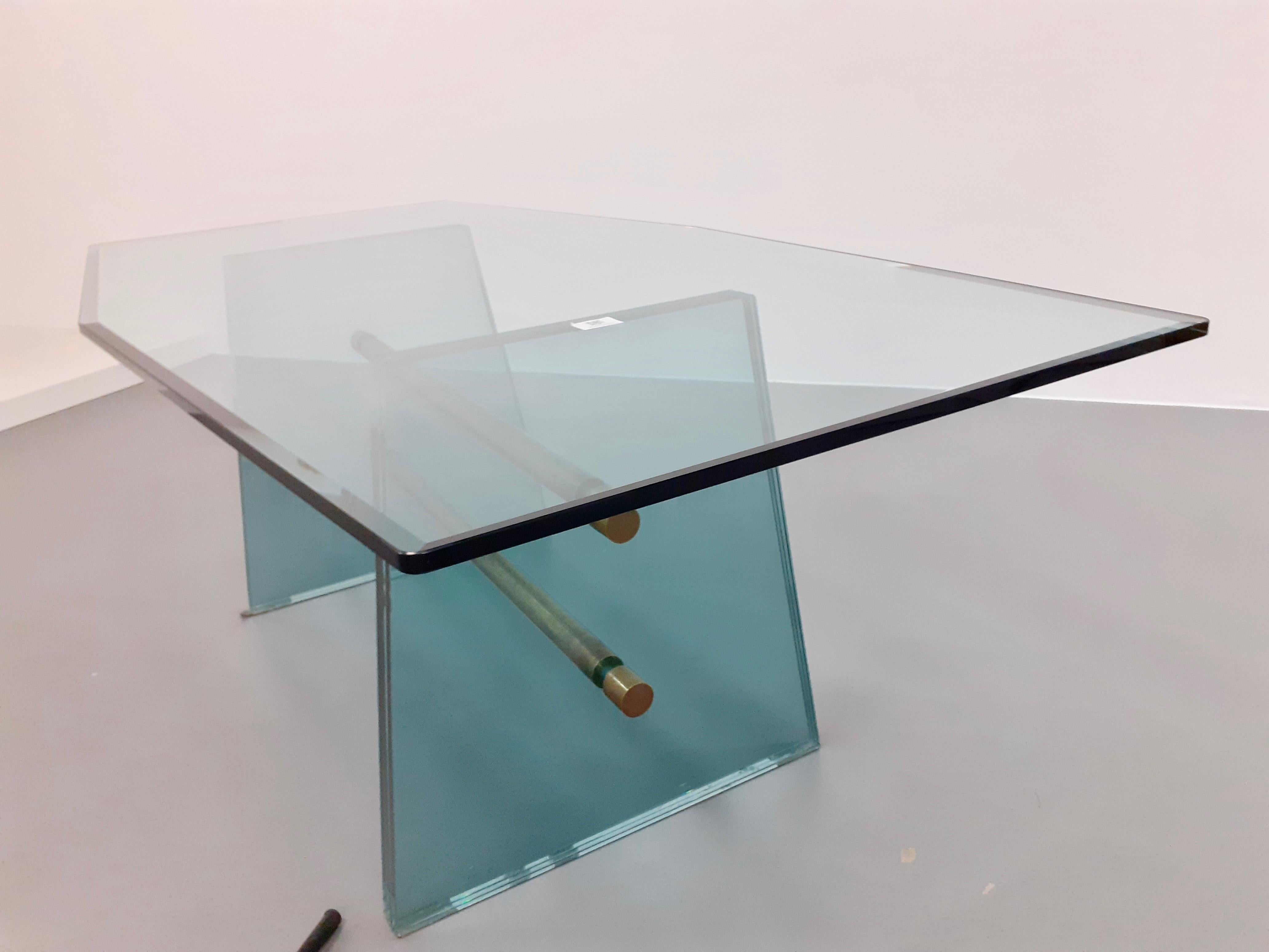 Large glass dining table designed by Pietro Chiesa and manufactured by Fontana Arte, Milano, circa 1940
extremely rare and important monumental dining table
cut shaped top, massive and thick glass, two large nickeled brass central beam
three