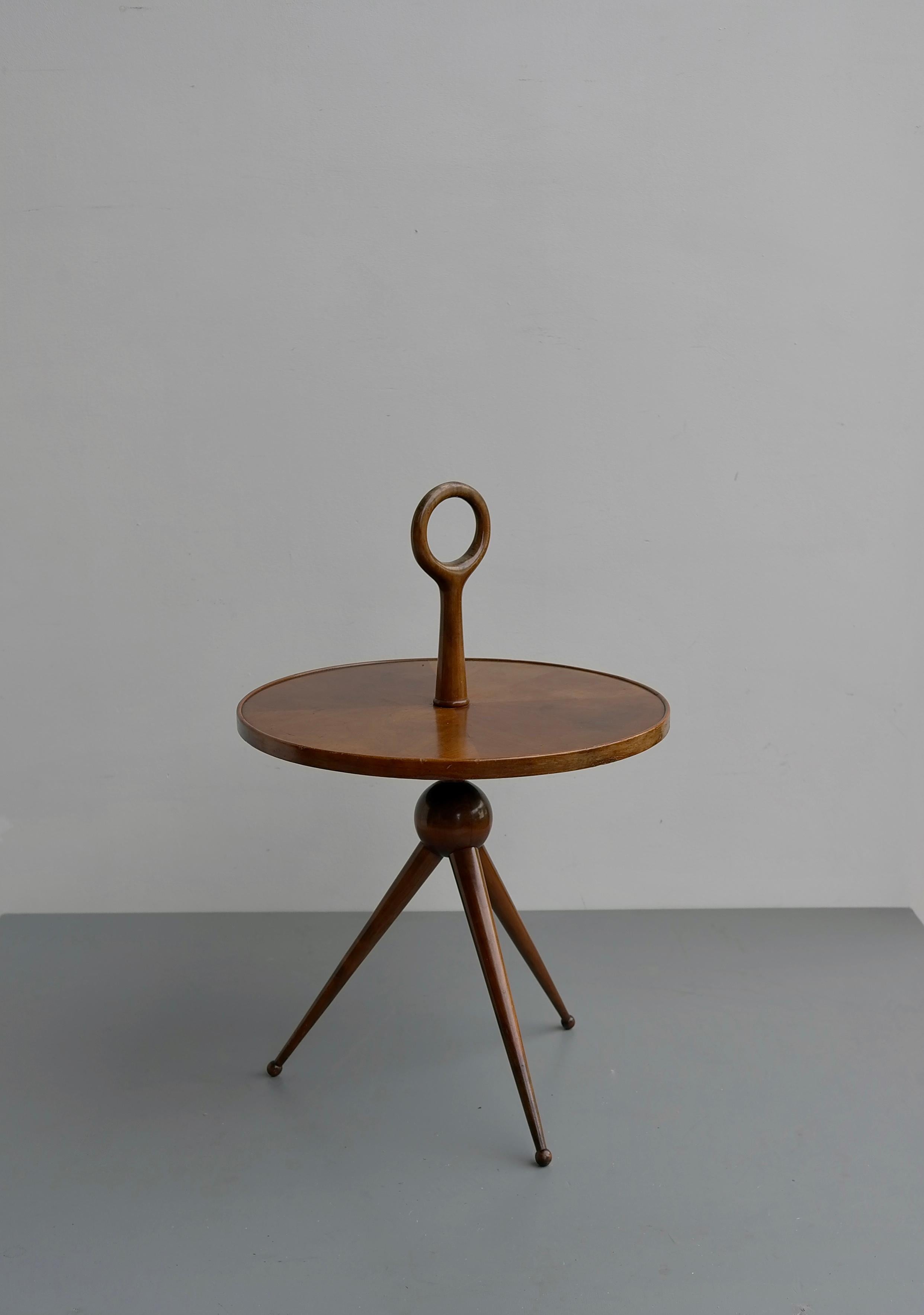 Rare Pietro Chiesa sculptural occasional table fully in wood, Italy 1950s.