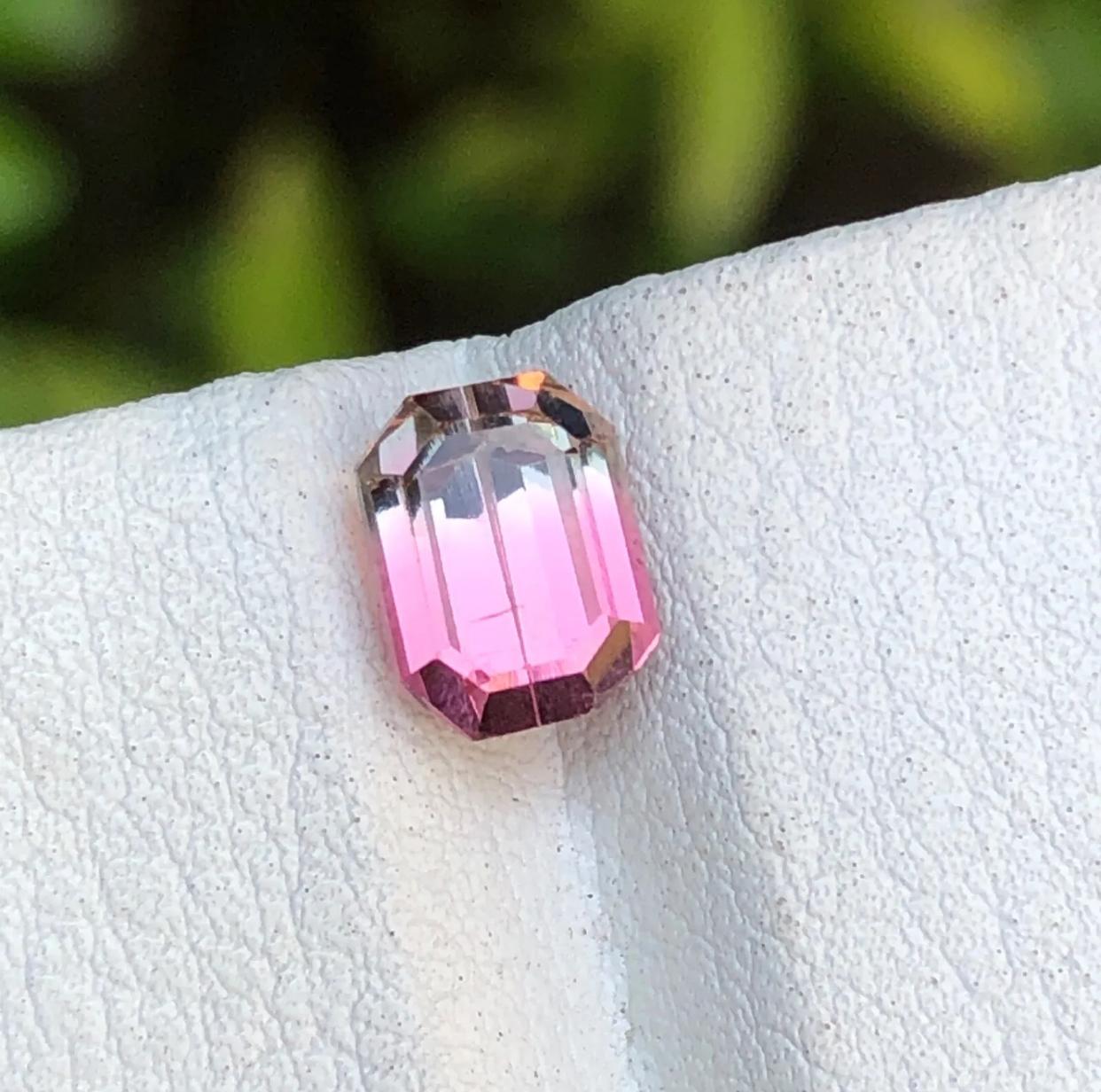 Gemstone Type: Tourmaline
Weight: 1.75 Carats
Dimensions: 7.24 x 5.50 x 5.19
Color: Bicolor
Clarity: Approximately 97% Eye Clean 
Treatment: Heated
Origin: Afghanistan
Certificate: On demand 

Indulge in the enchantment of our rare Pink Bicolor