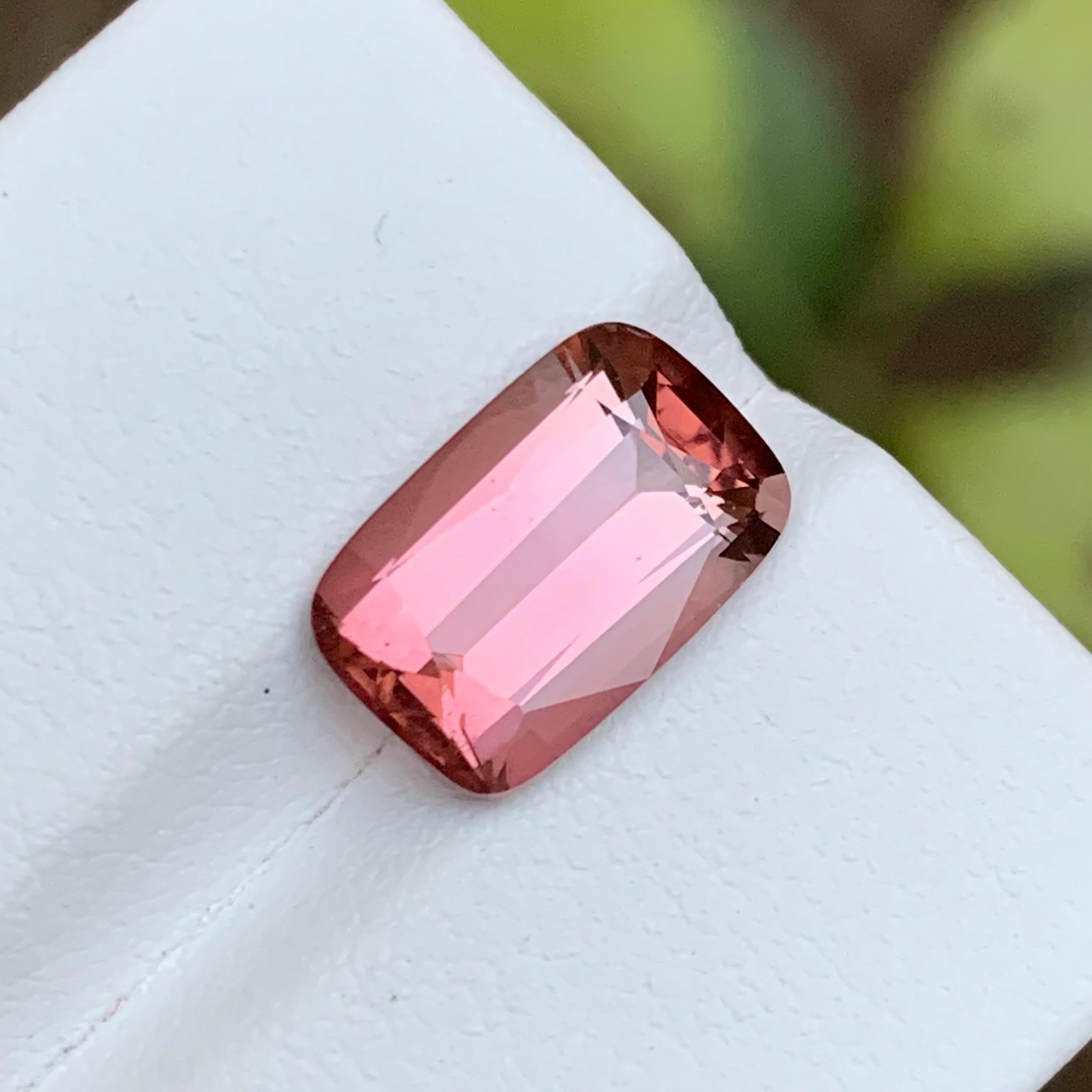 GEMSTONE TYPE: Tourmaline
PIECE(S): 1
WEIGHT: 4 Carats
SHAPE: Emerald
SIZE (MM):  12.07 x 7.87 x 5.49
COLOR: Pink 
CLARITY: Eye Clean
TREATMENT: Heated
ORIGIN: Afghanistan
CERTIFICATE: On demand

This mesmerizing 4 carat pink tourmaline gemstone,