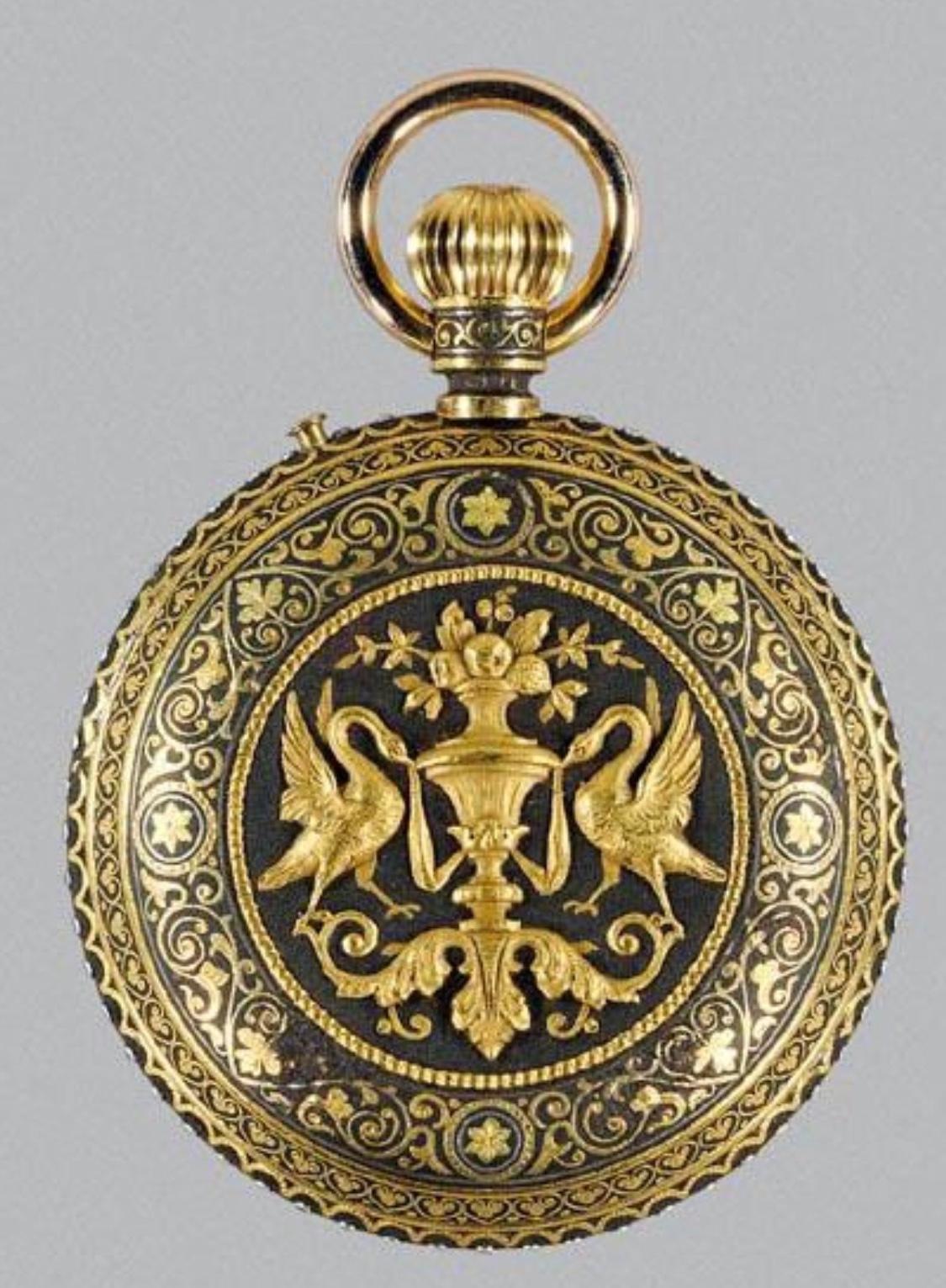 A rare Placido Zuloaga Spanish damascened gold and steel pocket watch,
circa 1885.

The interior signed in monogram PZ, the movement signed: Ch. Ed. Larvet, Fleurier Suisse, No. 15905

The case applied with two delicate chased gold swans