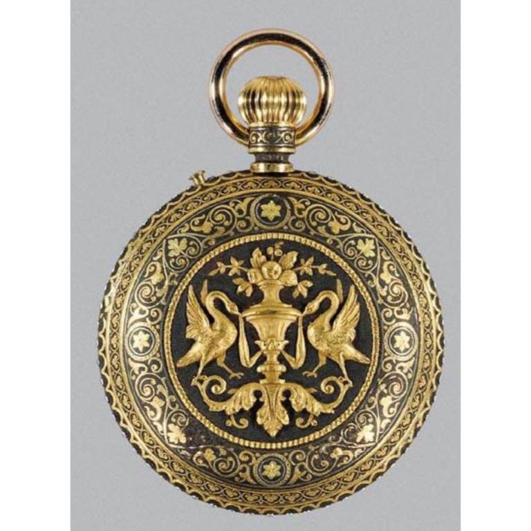 A rare Placido Zuloaga Spanish damascened gold and steel pocket watch, circa 1885.  The interior signed in monogram PZ, the movement signed: Ch. Ed. Larvet, Fleurier Suisse, No. 15905  The case applied with two delicate chased gold swans flanking an