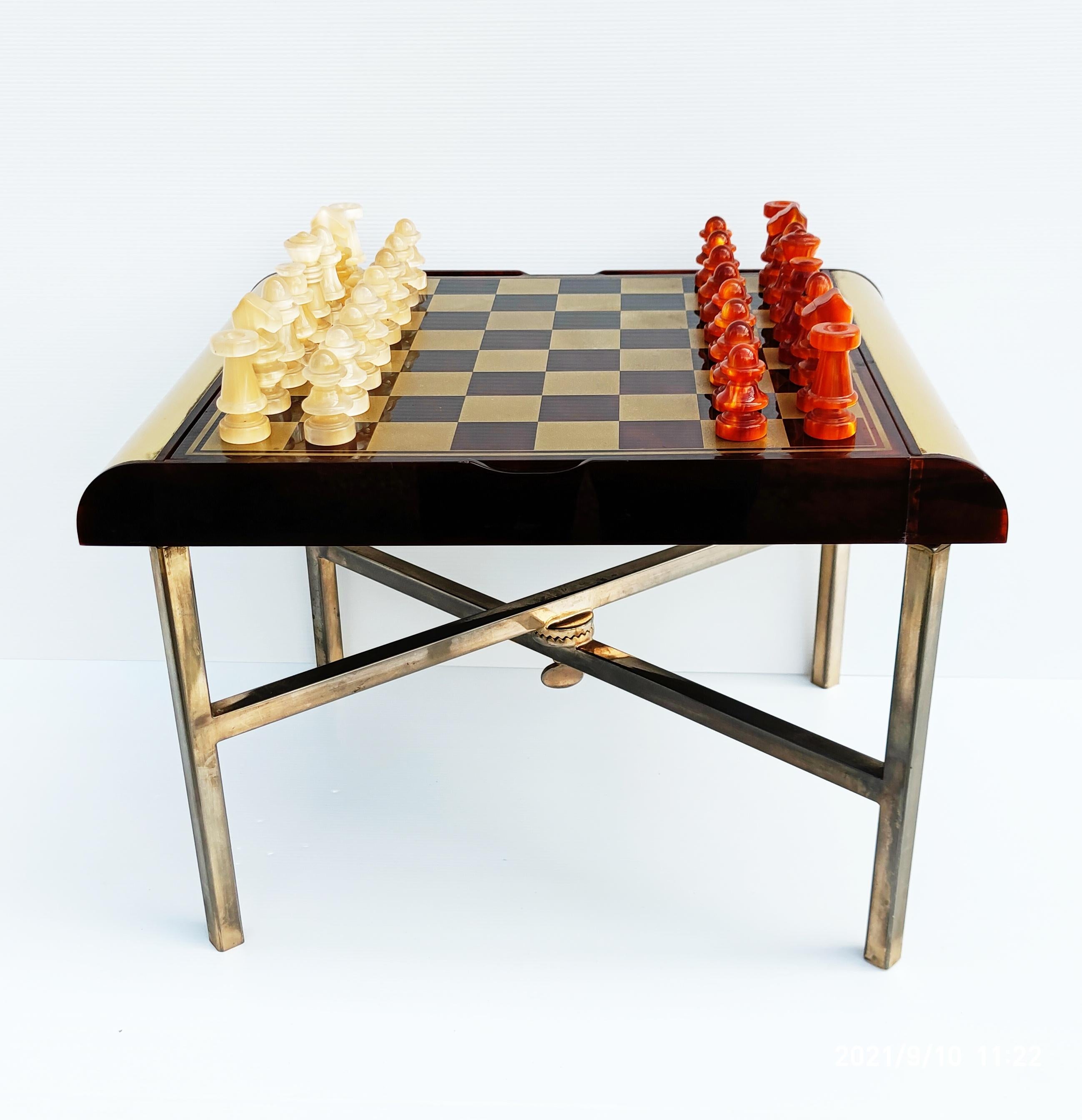 Rare and beautiful plexiglas chess set on table manufactured in Italy in 1970s.
Storage box inside, and checkerboard included. the table legs are folding.
In very good vintage condition.