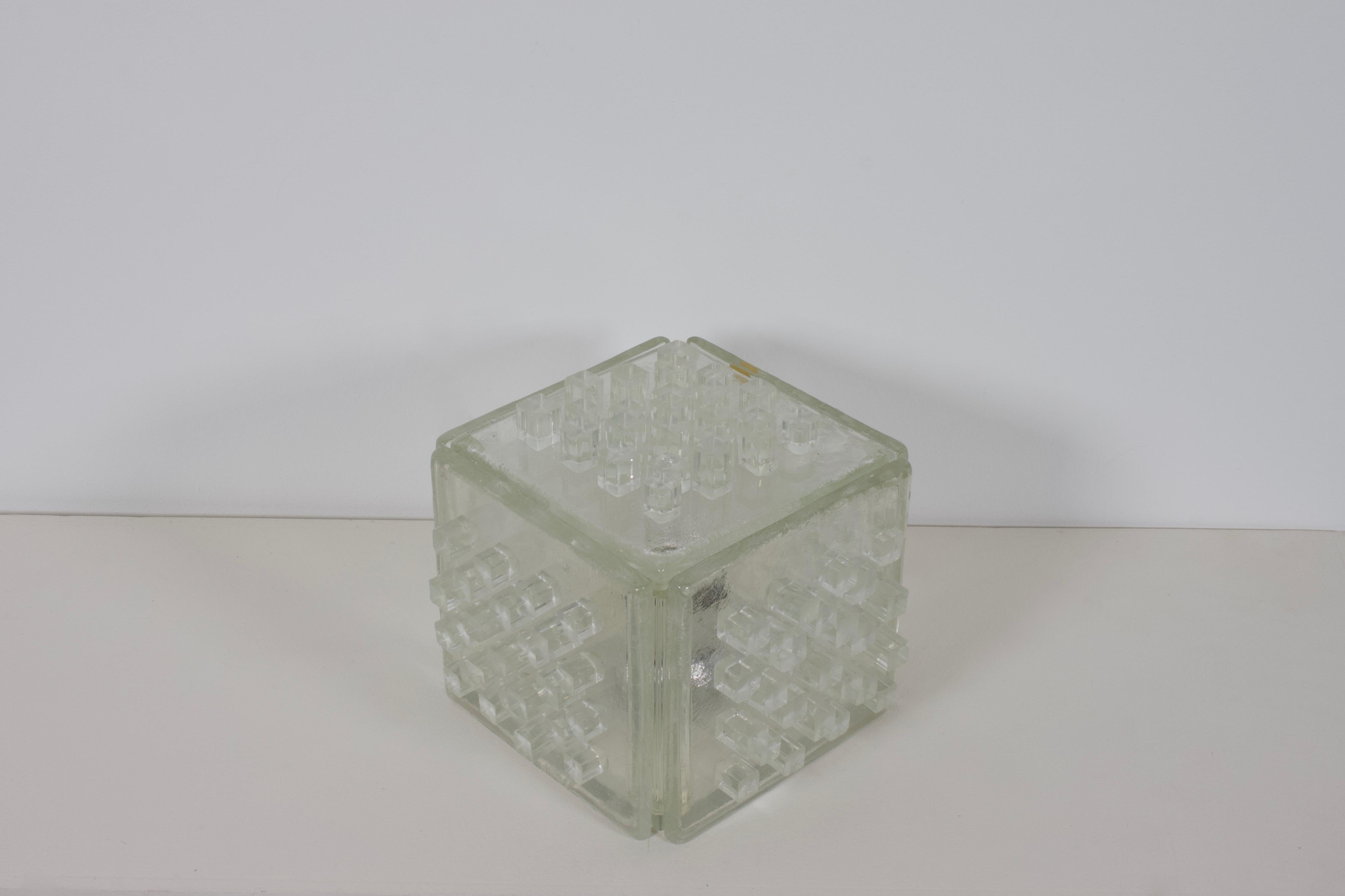 Original Poliarte ‘Apis’ lamp in very good condition.

This lamp is made of thick slabs of raw crystal with a graphic pattern of glass cubes on each side.

The raw glass creates a great light effect when lit.

It still has the original
