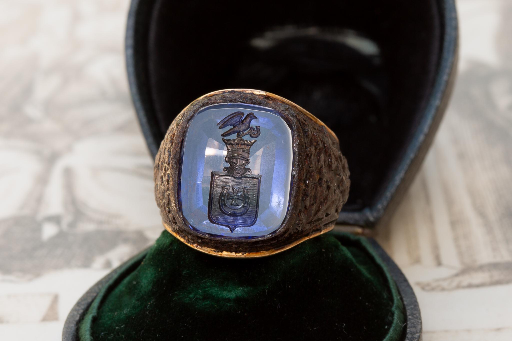 This very rare and unusual ring was made in Poland and dates from the early 20th century, circa 1920. It is crafted in gold and iron and set with a sapphire intaglio. The sapphire has been masterfully engraved to depict the ‘Jastrzębiec’ coat of