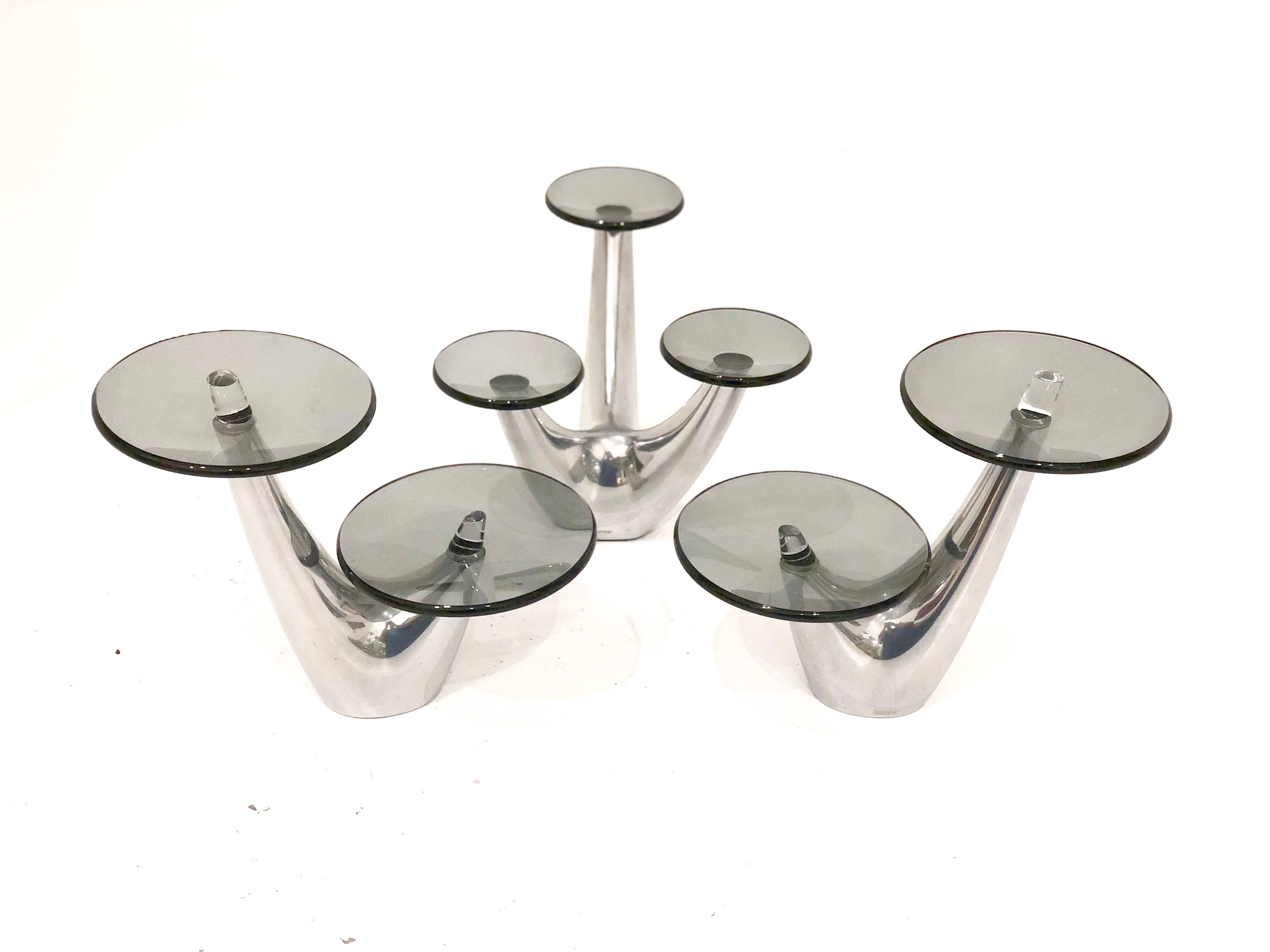 Rare three-piece stand for hors d'oeuvre, called Morphik designed by Karim Rashid, in polished aluminum base with smoke glass tops, condition its excellent.4.5