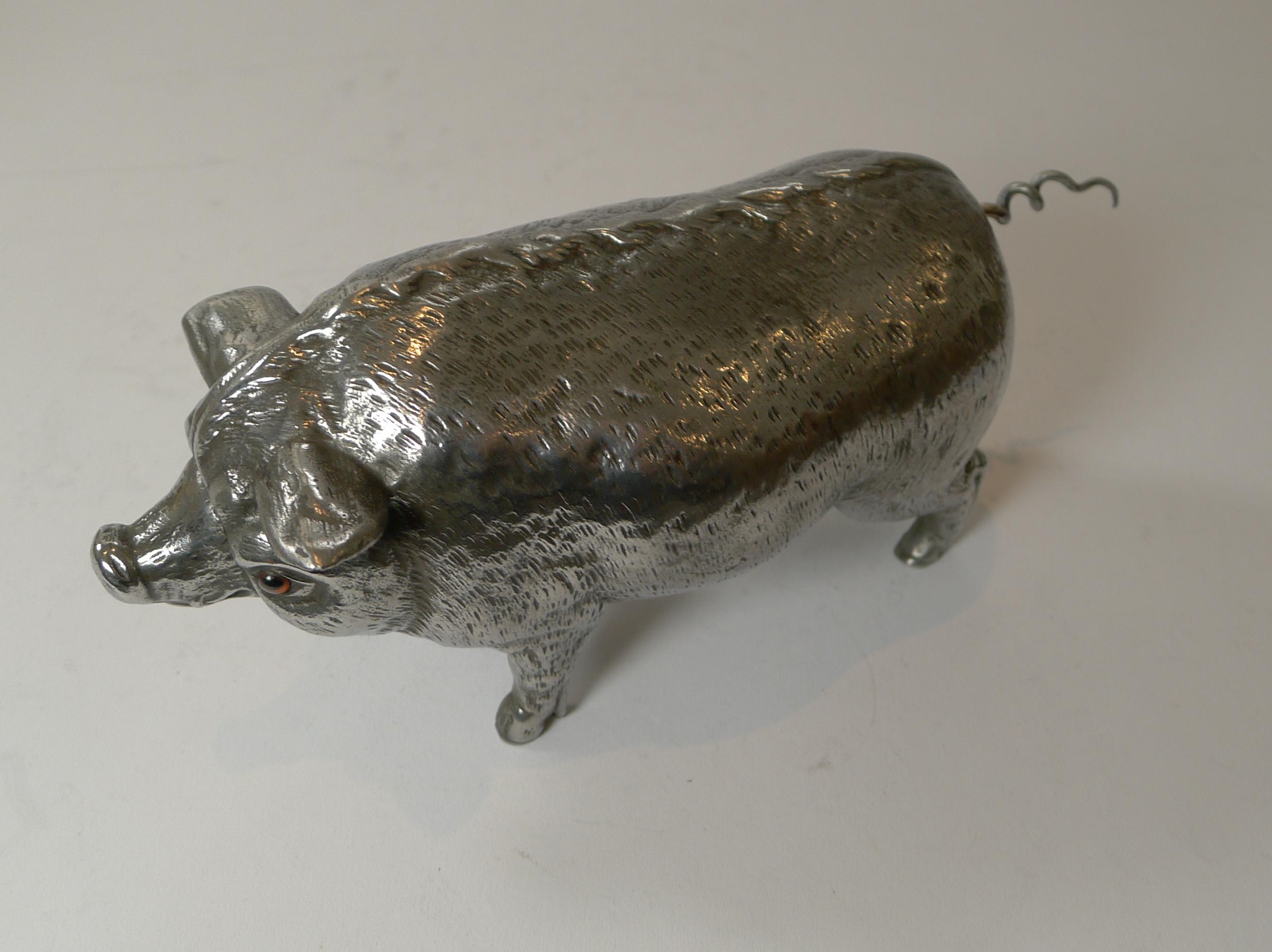 A rare find, this fabulous figural desk bell was cast in metal in the form of a pig with a quality screwed construction. The mechanical bell can be would from the underside and then rung either by the snout or tail.

I believe German in origin,