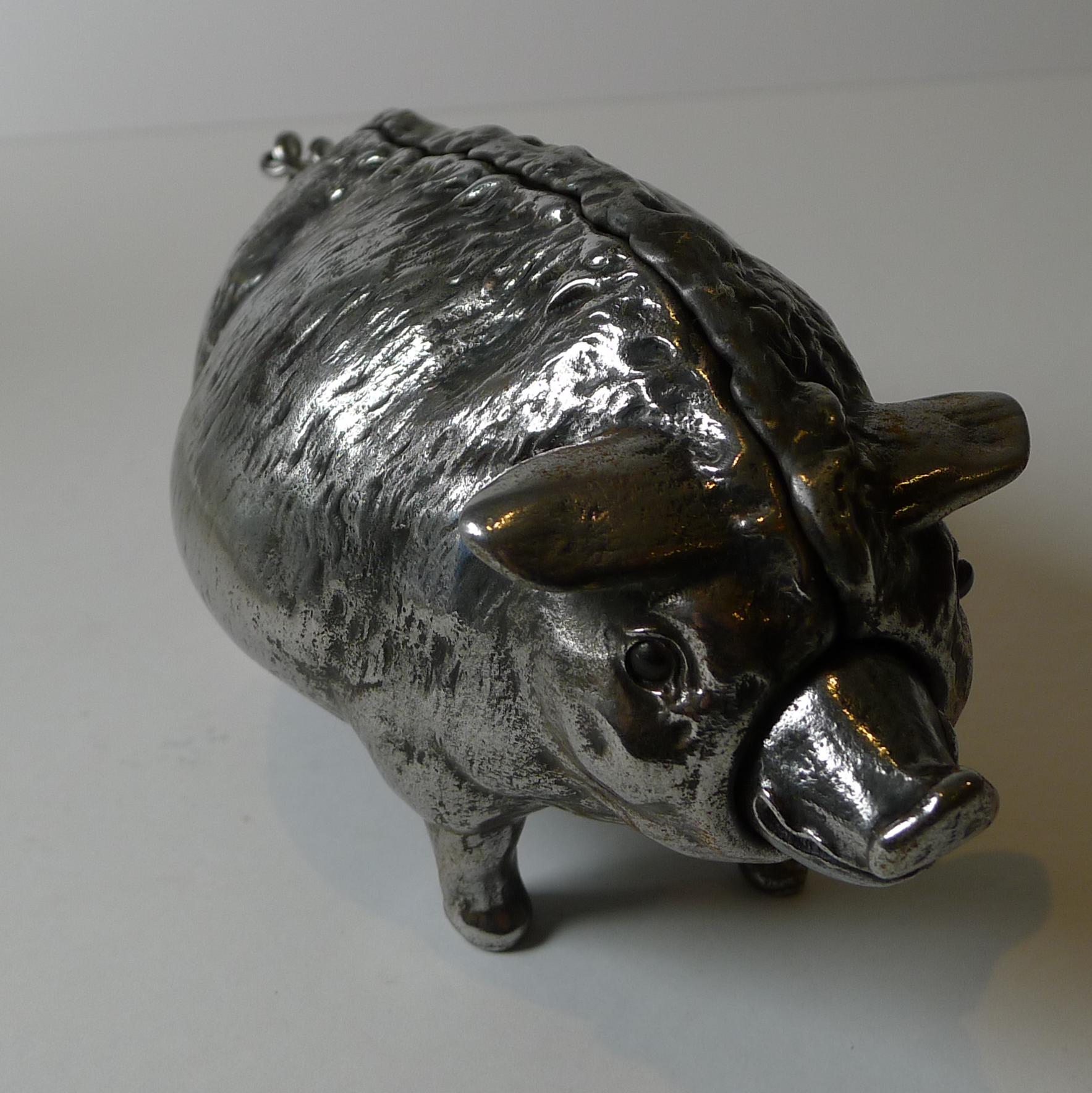 A rare find, this fabulous figural desk bell was cast in metal in the form of a pig with a quality screwed construction. The mechanical bell can be would from the underside and then rung either by the snout or tail.

I believe German in origin,